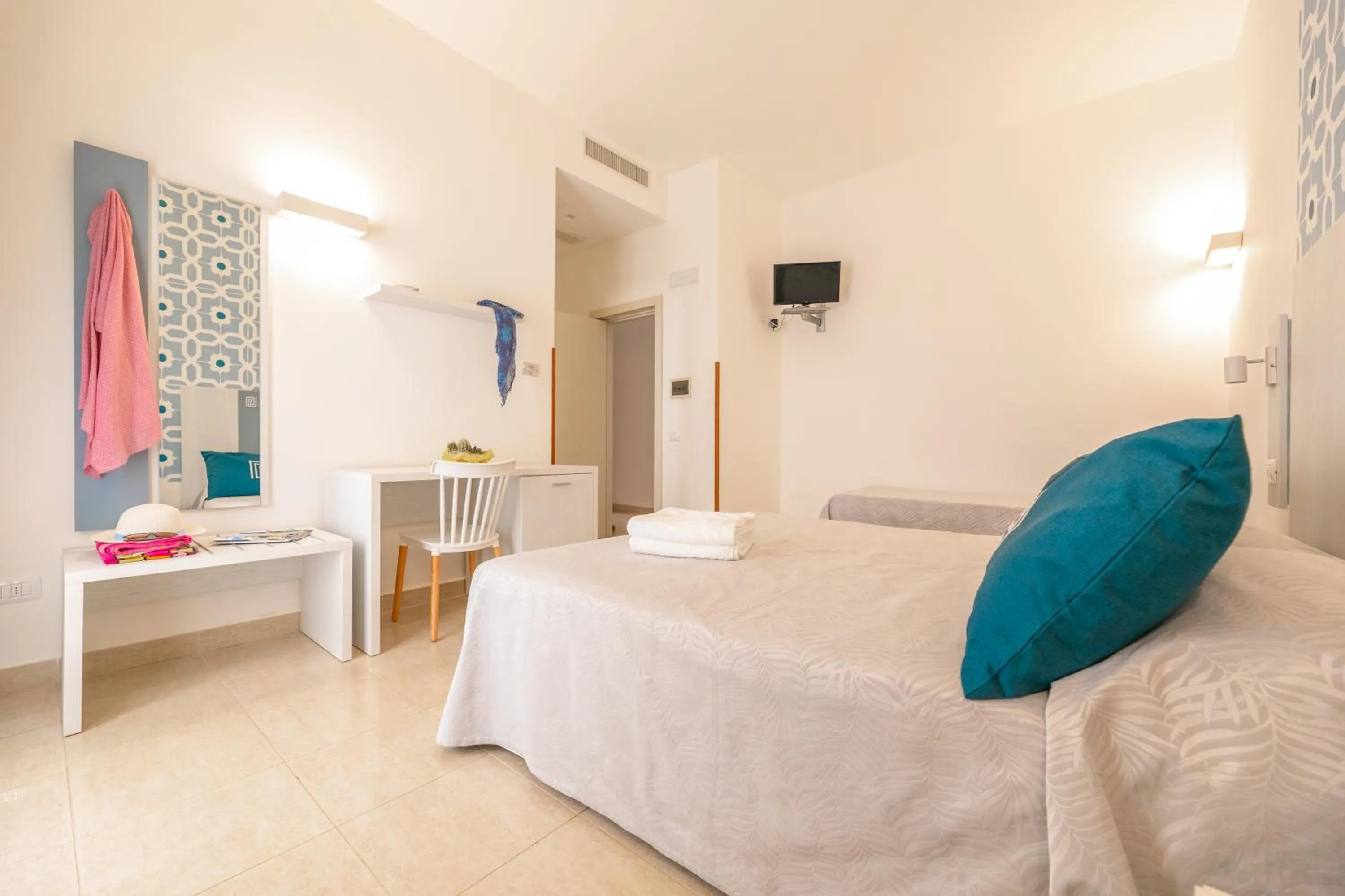 Bed in Hotel Magna Grecia