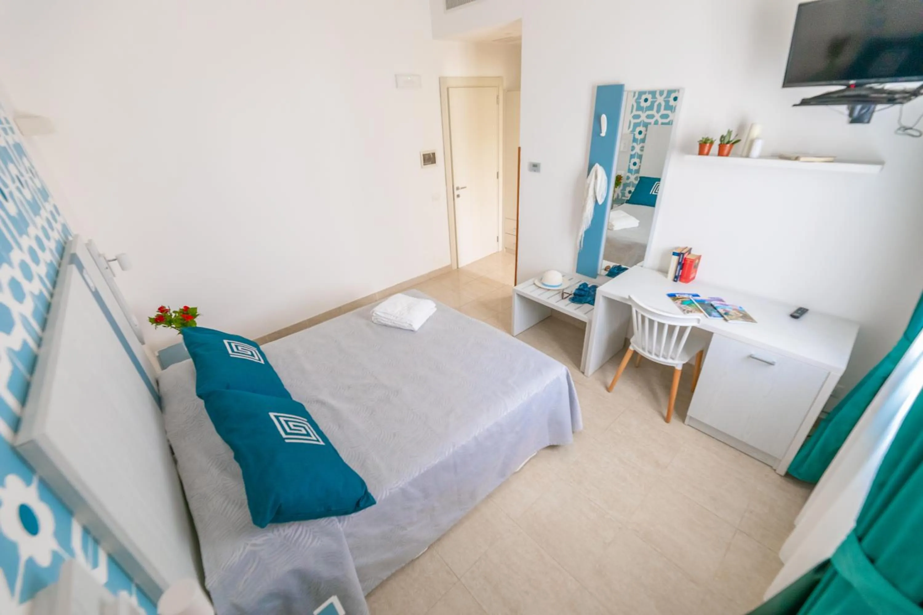 Bed in Hotel Magna Grecia