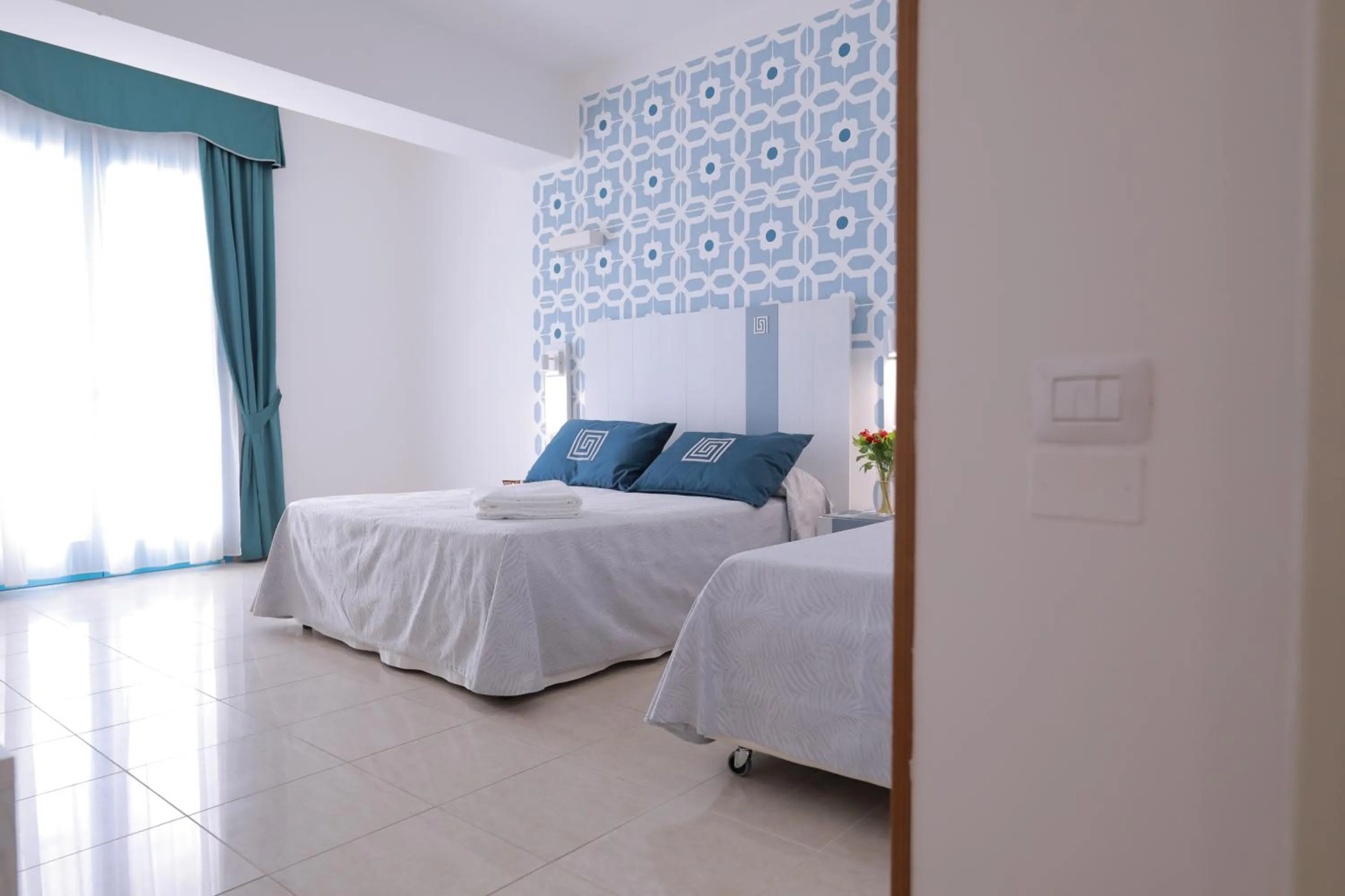 Bed in Hotel Magna Grecia