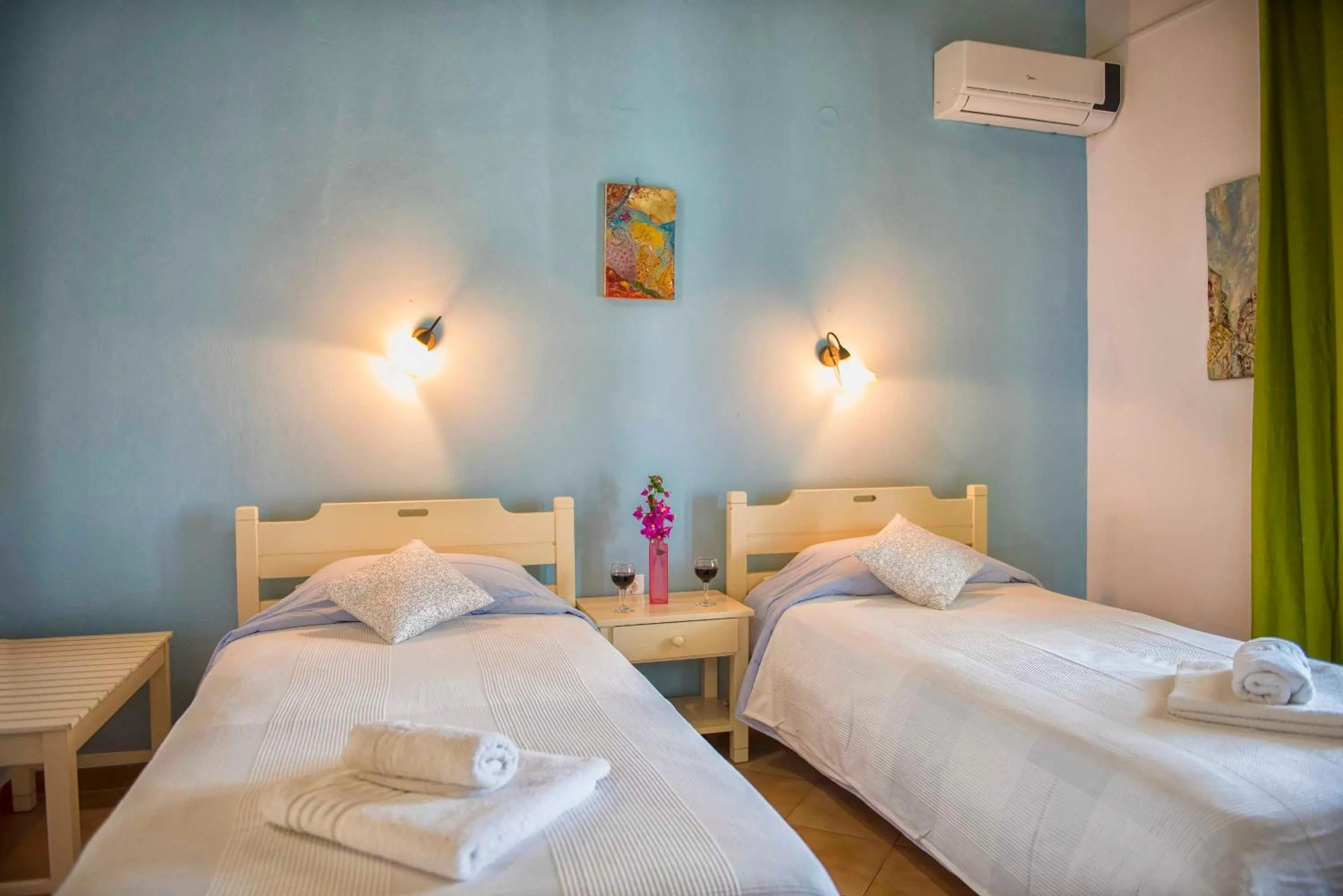 Bed in Elli Beach Apartments and Studios