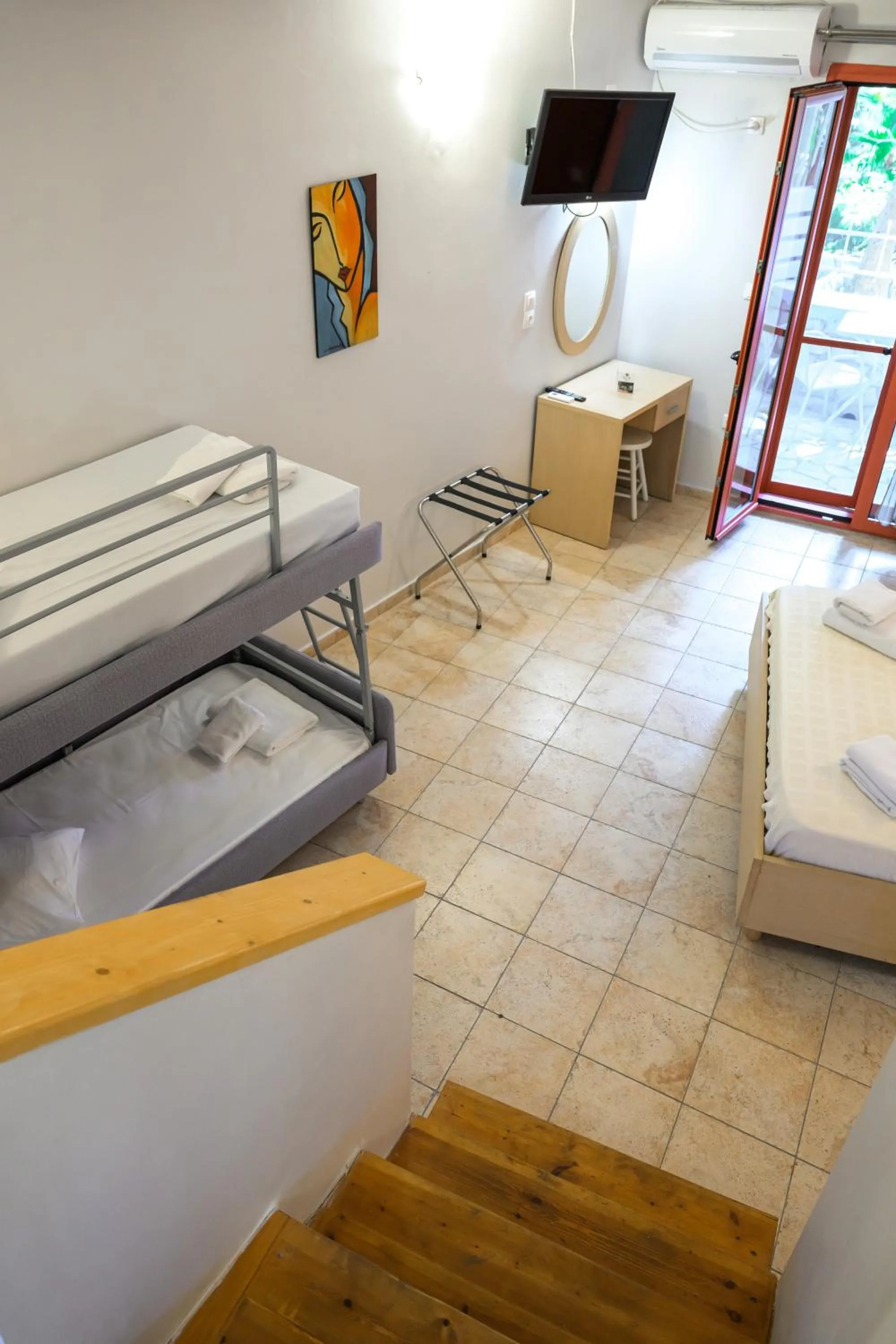 Bed in Rouda Bay Beach Hotel