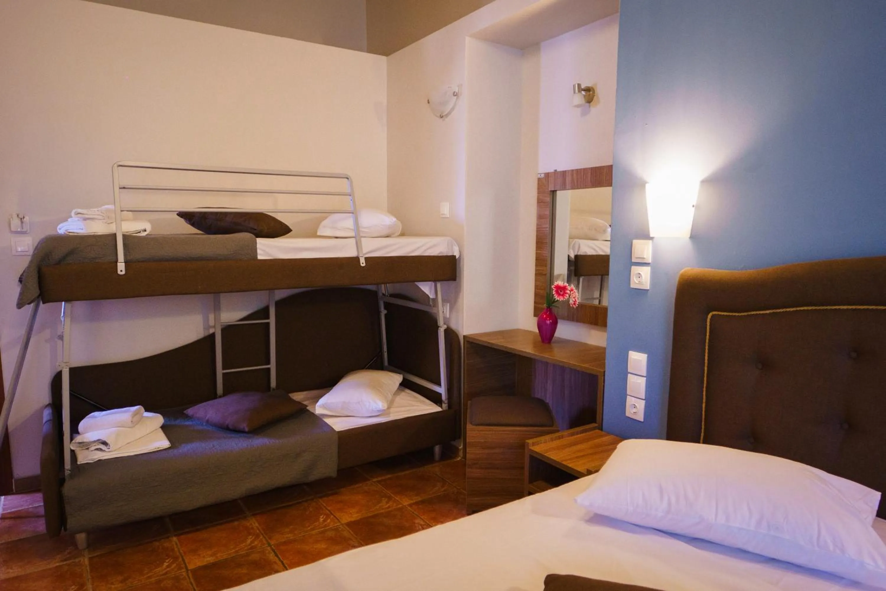 Bed in Rouda Bay Beach Hotel