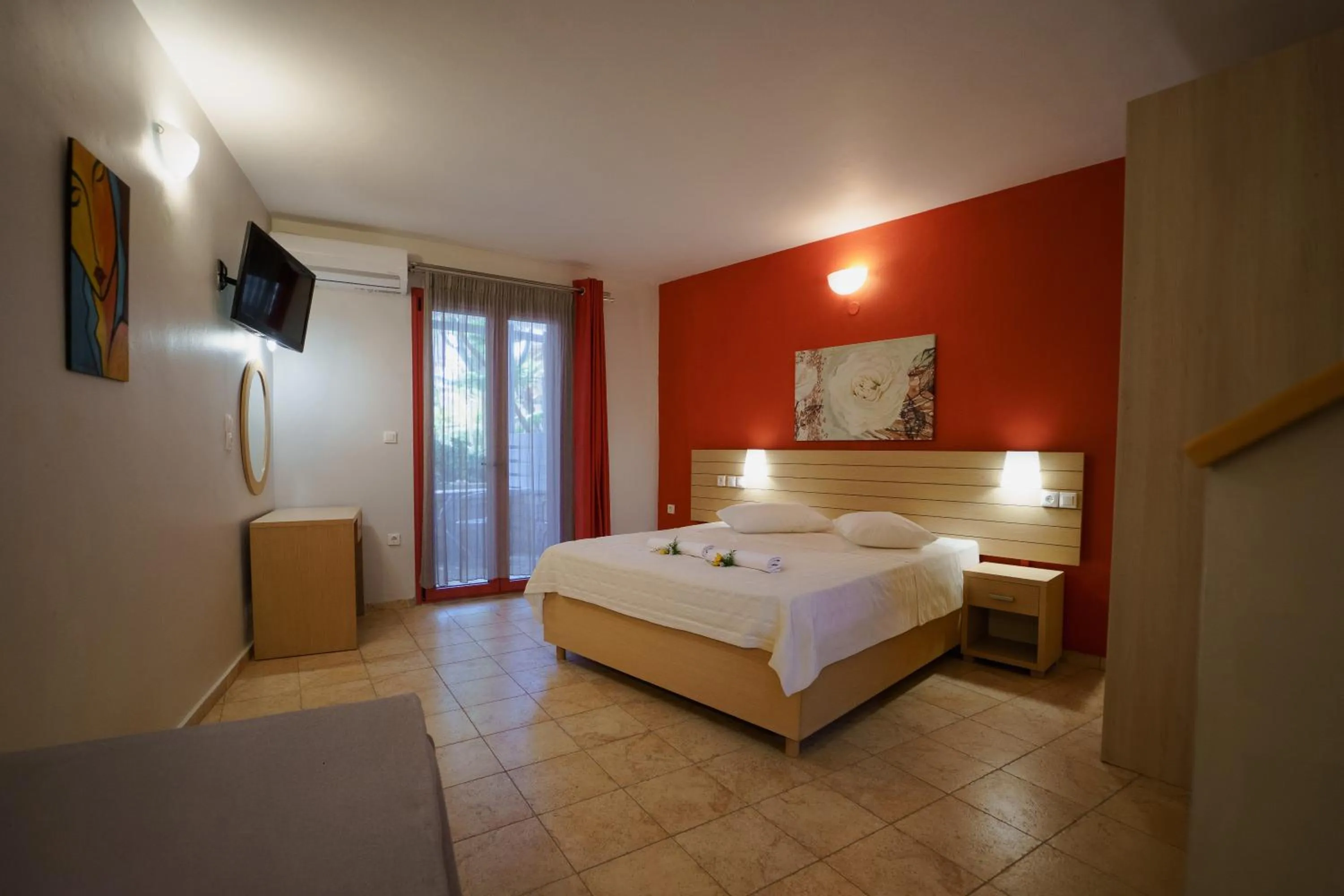 Bed in Rouda Bay Beach Hotel