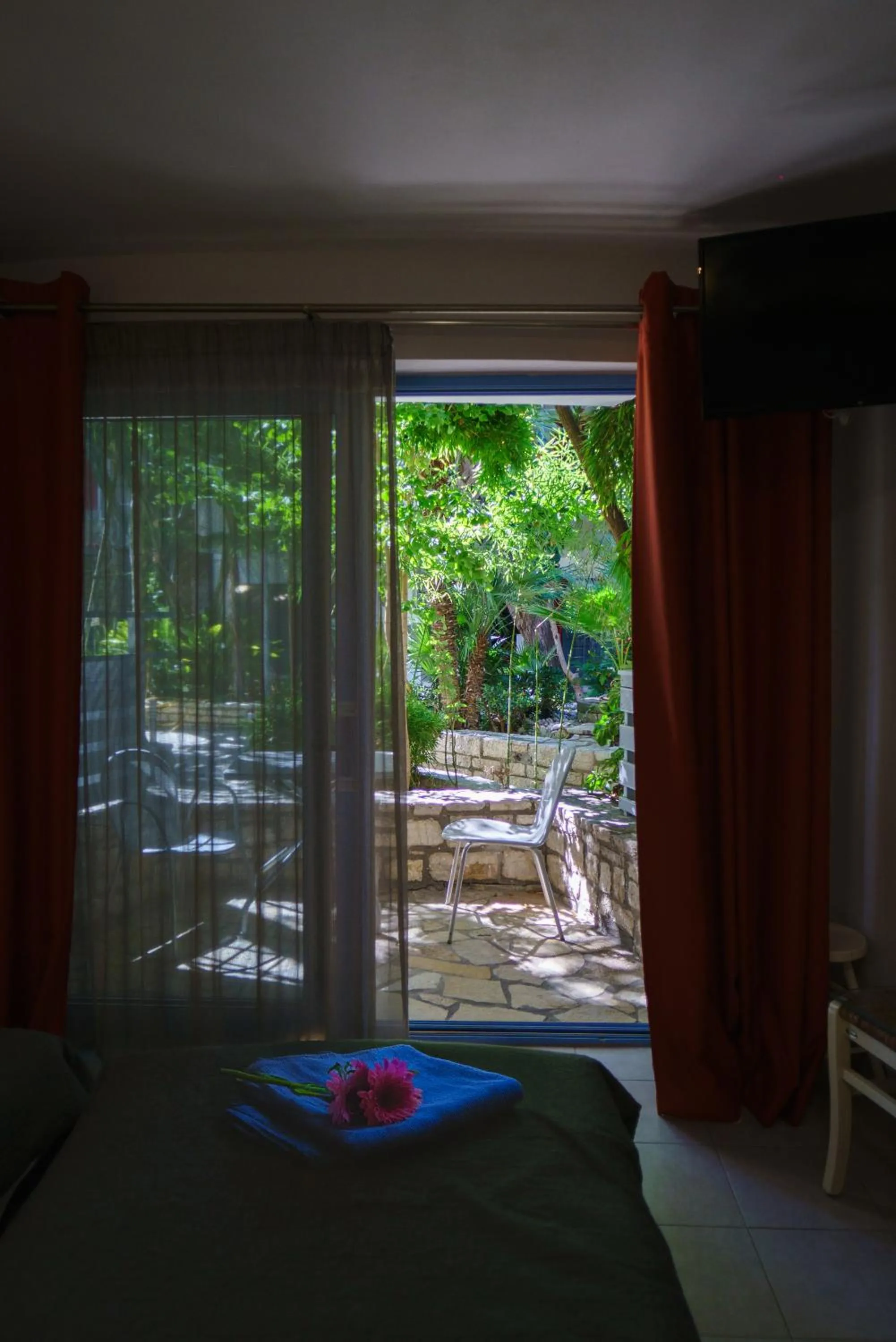 Bed in Rouda Bay Beach Hotel