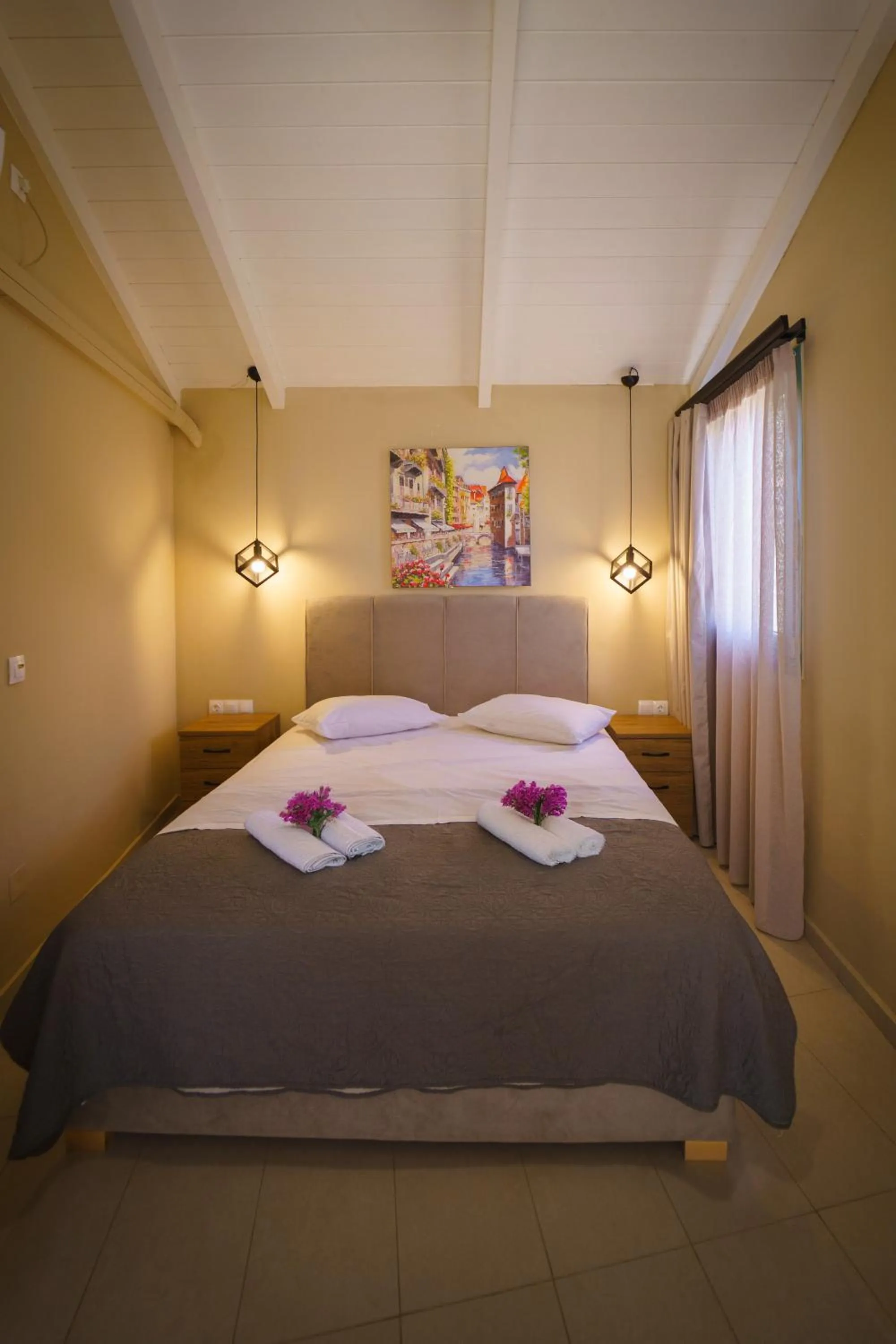 Bed in Rouda Bay Beach Hotel