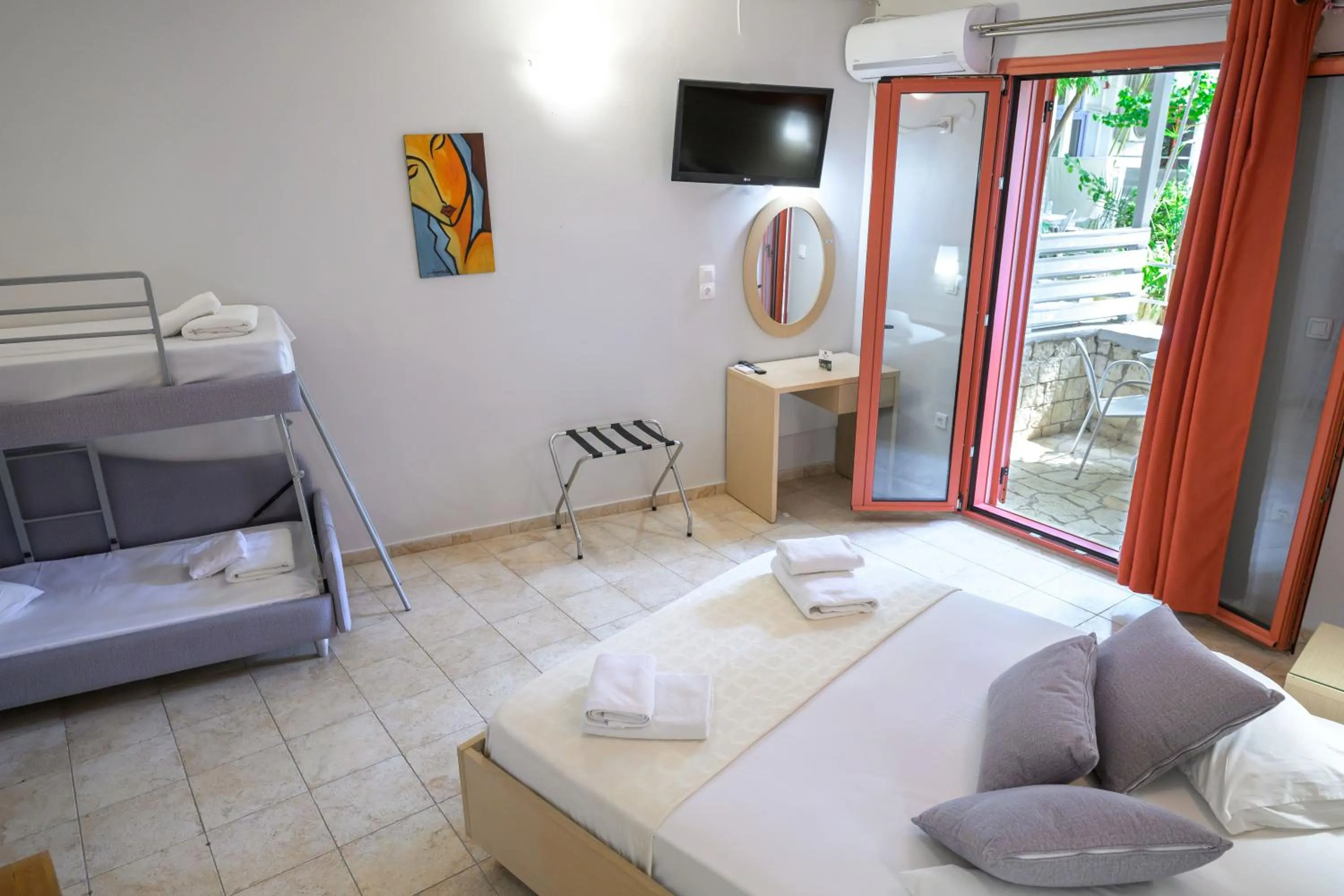 Bed in Rouda Bay Beach Hotel