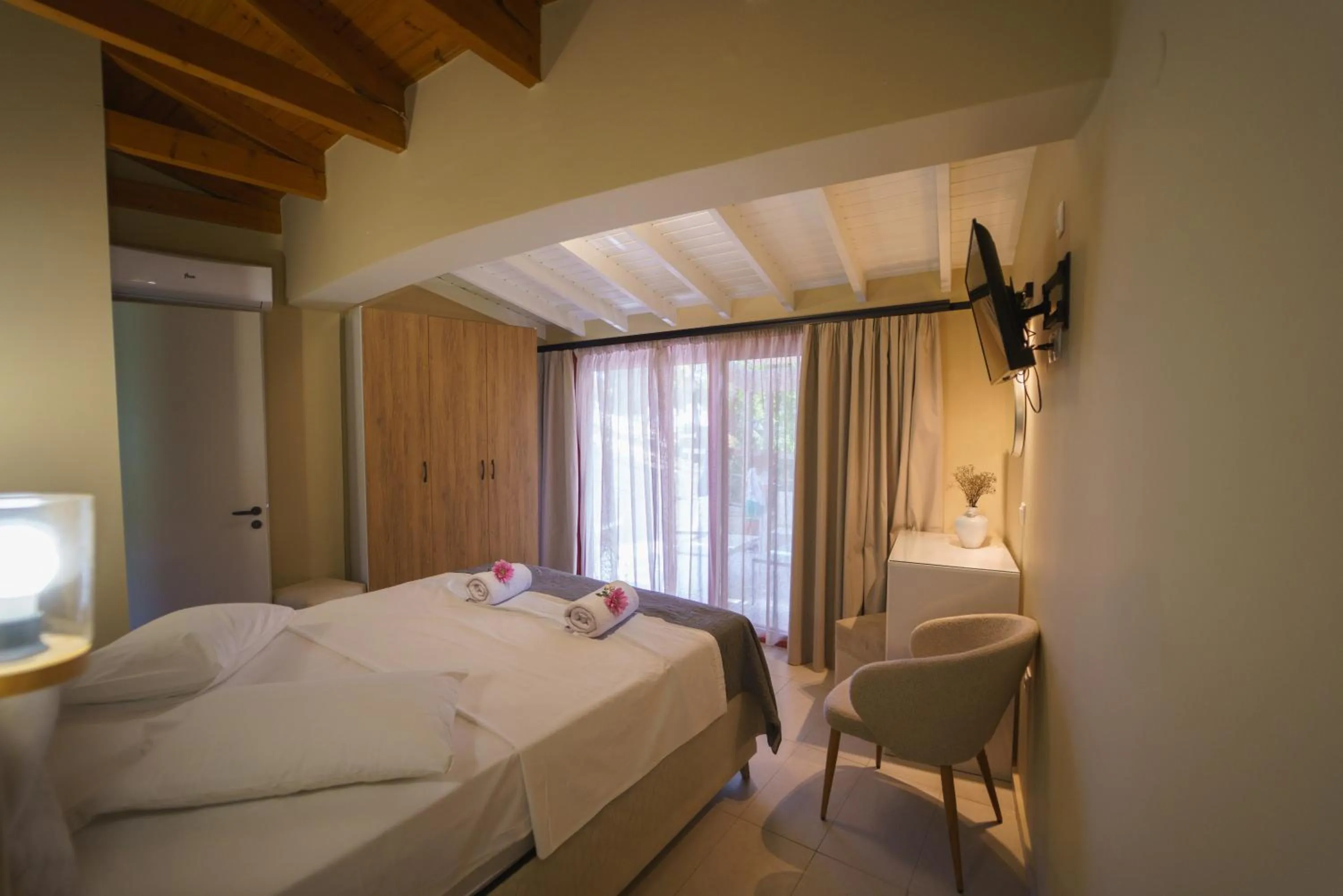 Bed in Rouda Bay Beach Hotel