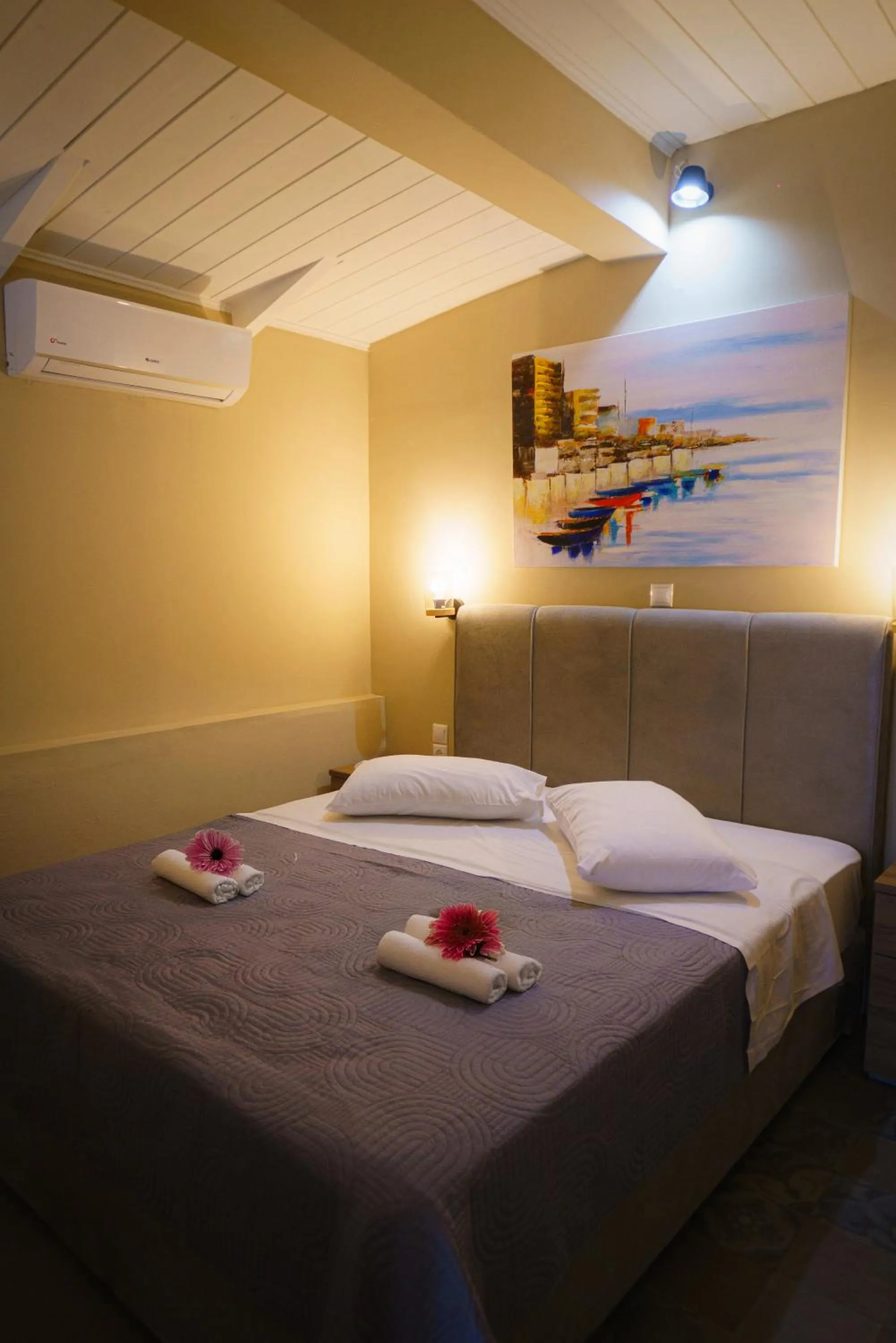 Bed in Rouda Bay Beach Hotel