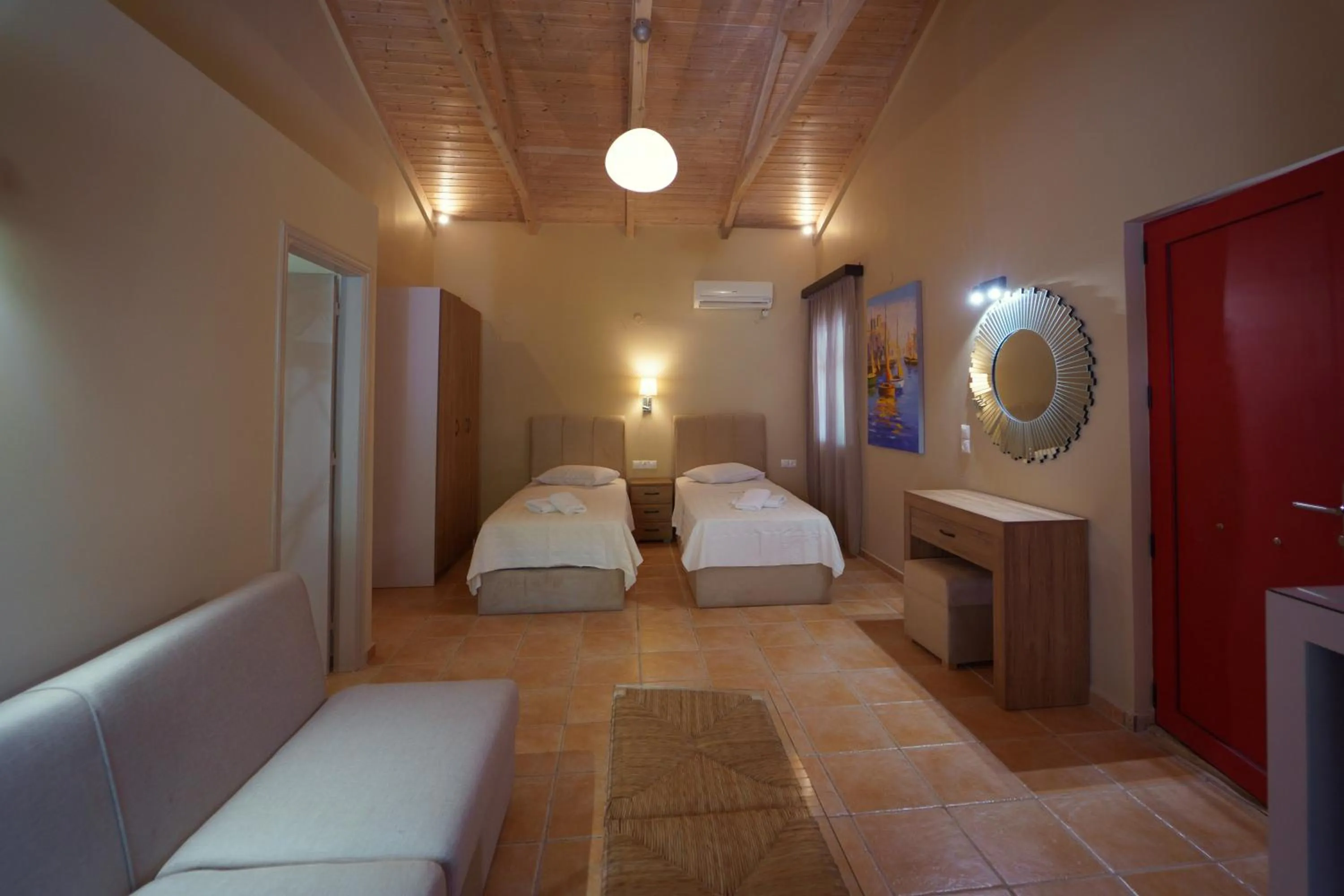 Bed in Rouda Bay Beach Hotel