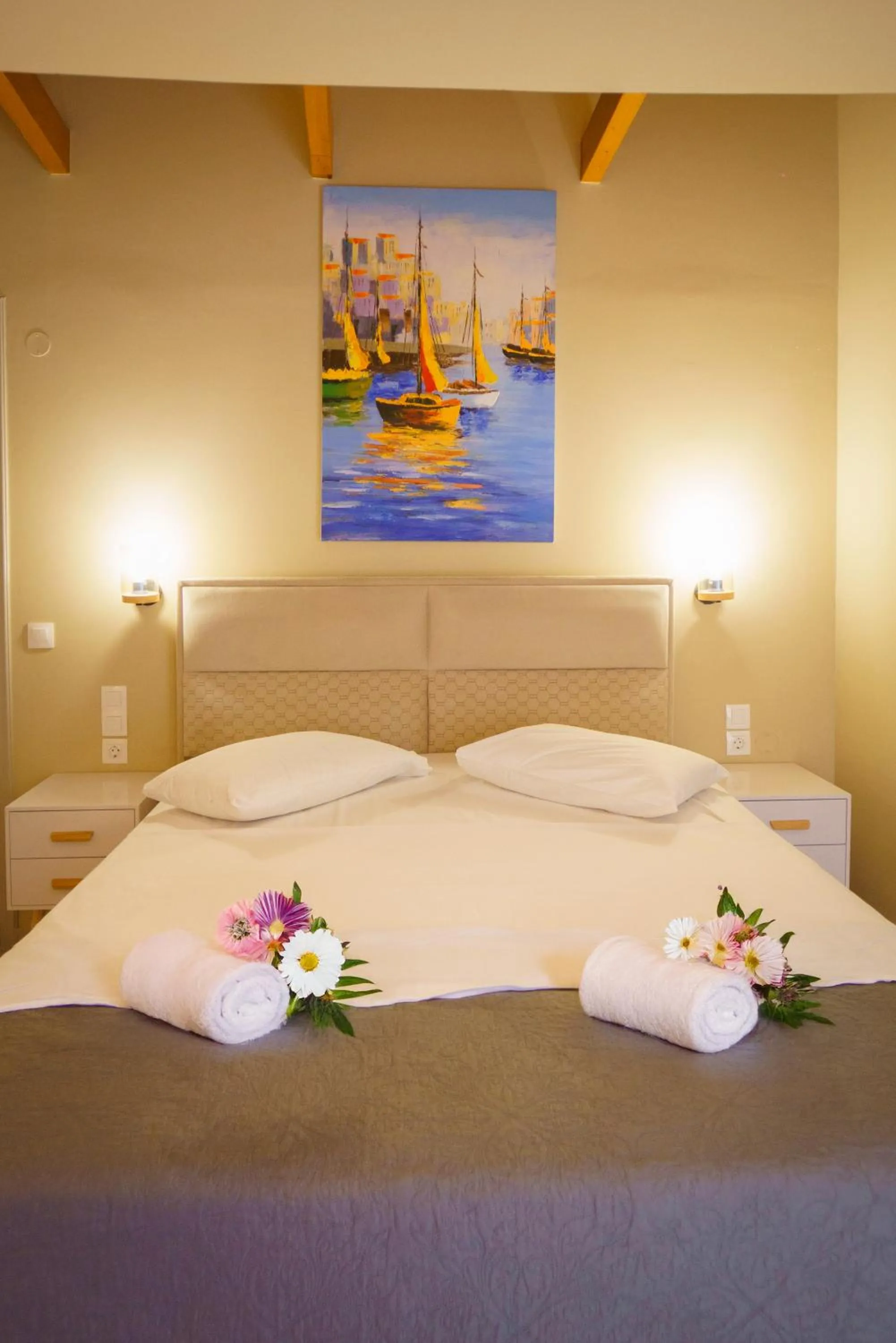 Bed in Rouda Bay Beach Hotel