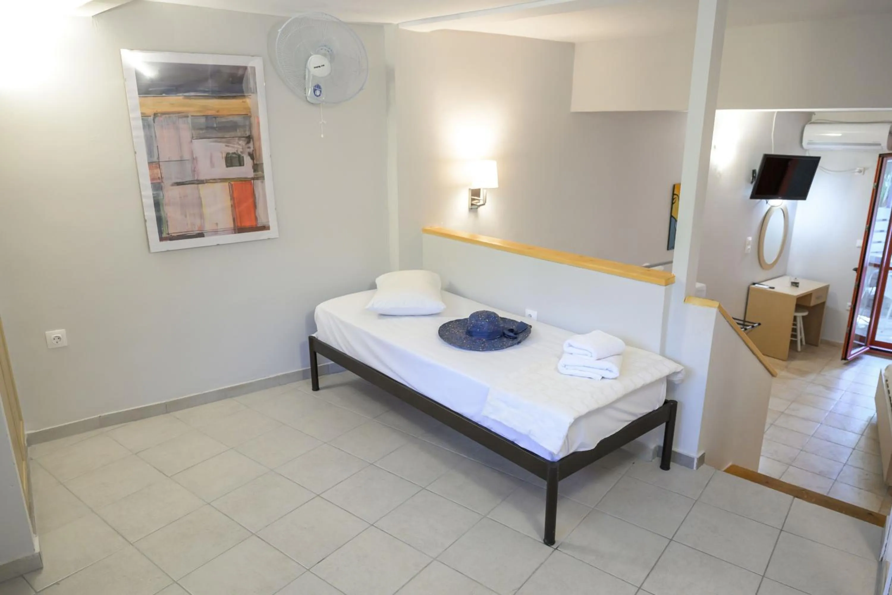 Bed in Rouda Bay Beach Hotel