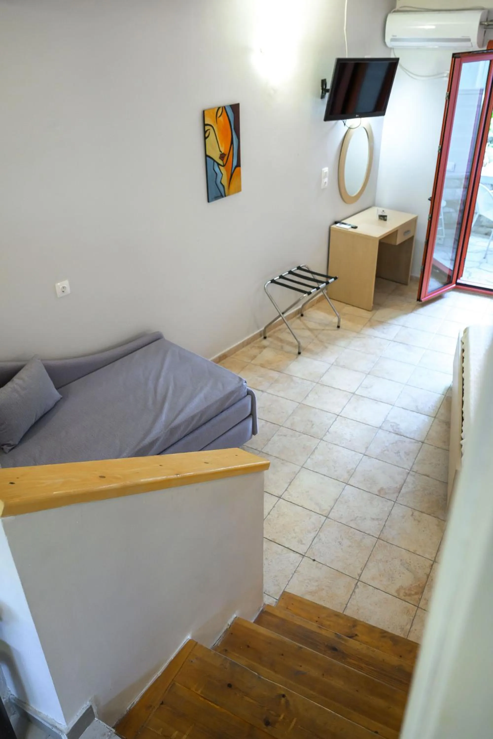 Bed in Rouda Bay Beach Hotel