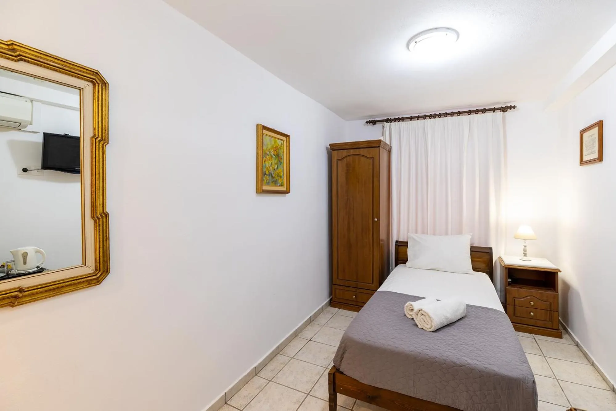 Bed in Achilleas Pension