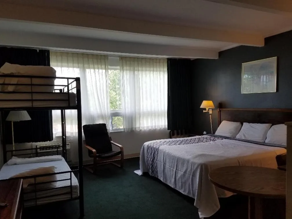 Bed in Travelodge by Wyndham Lake George NY