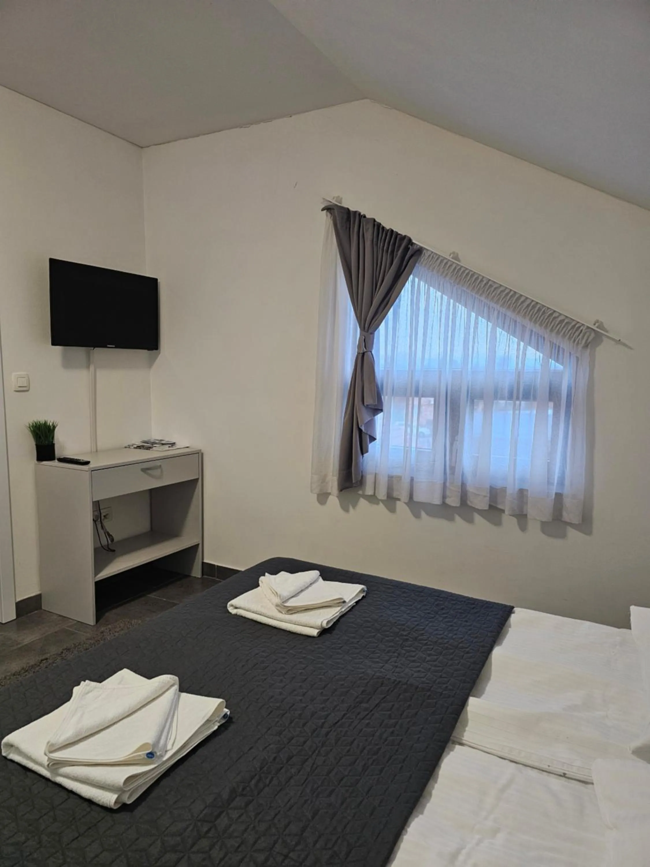 Bed in Filipovic rent a car & apartments