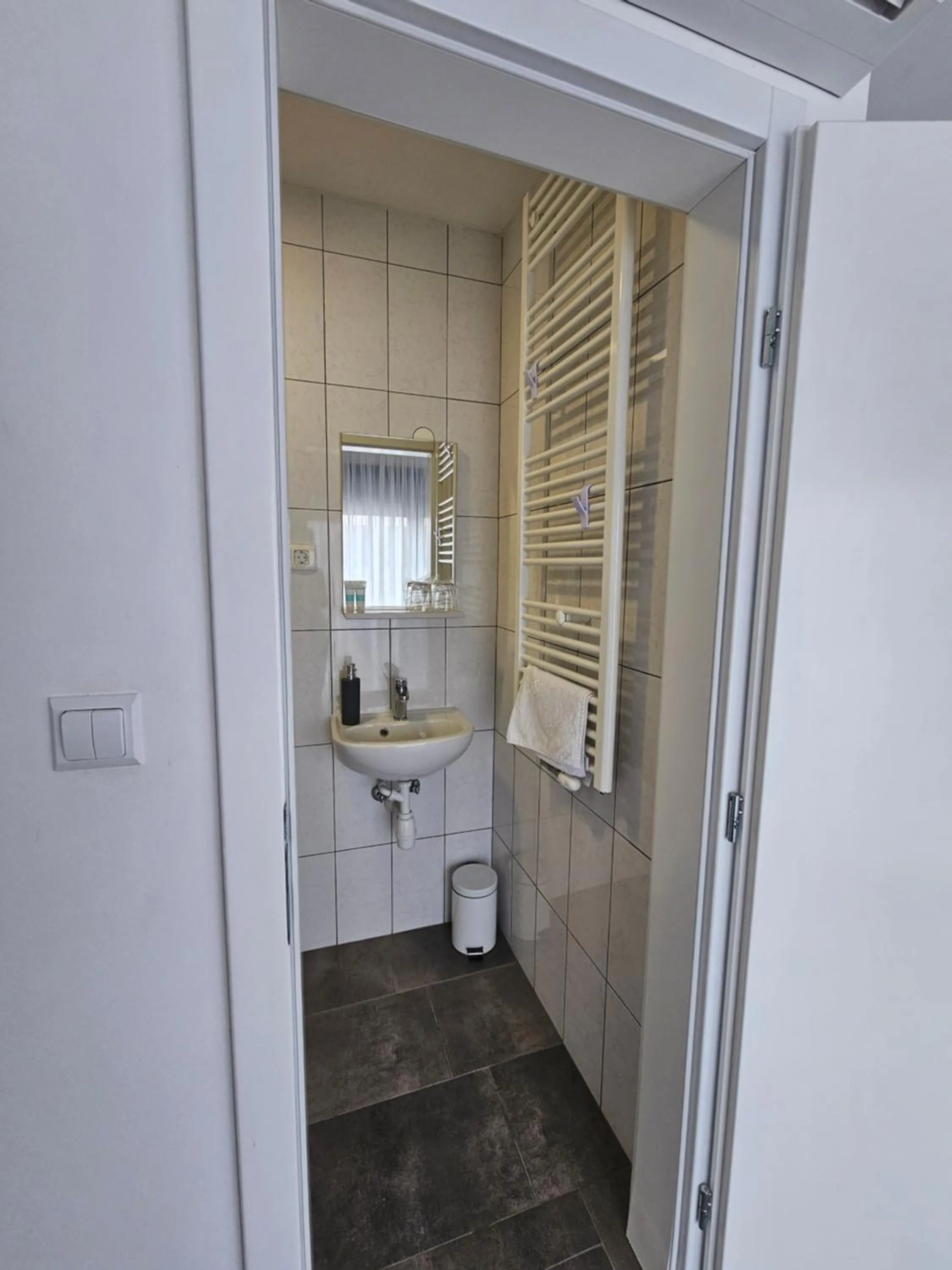 Bathroom in Filipovic rent a car & apartments