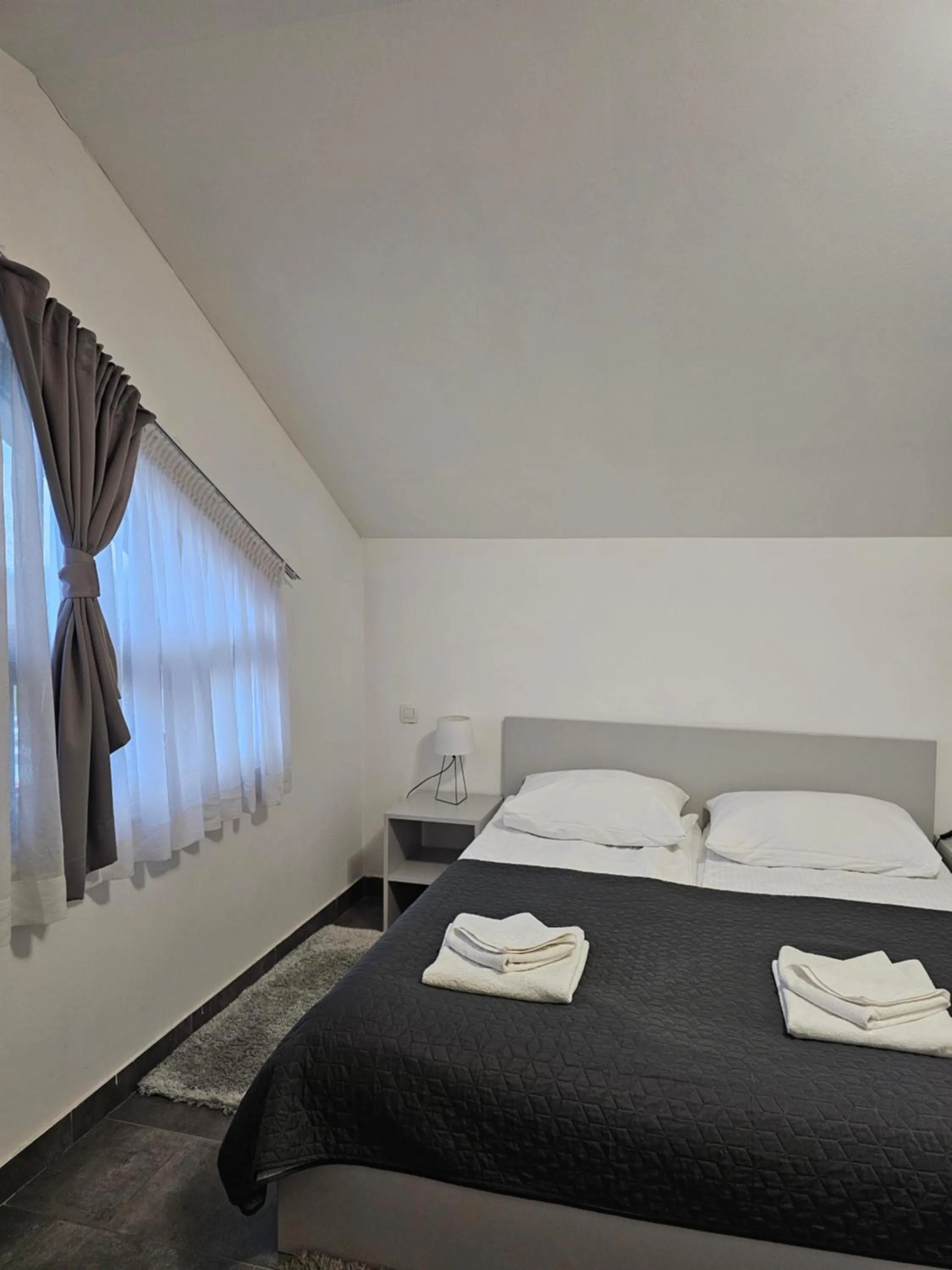 Bed in Filipovic rent a car & apartments