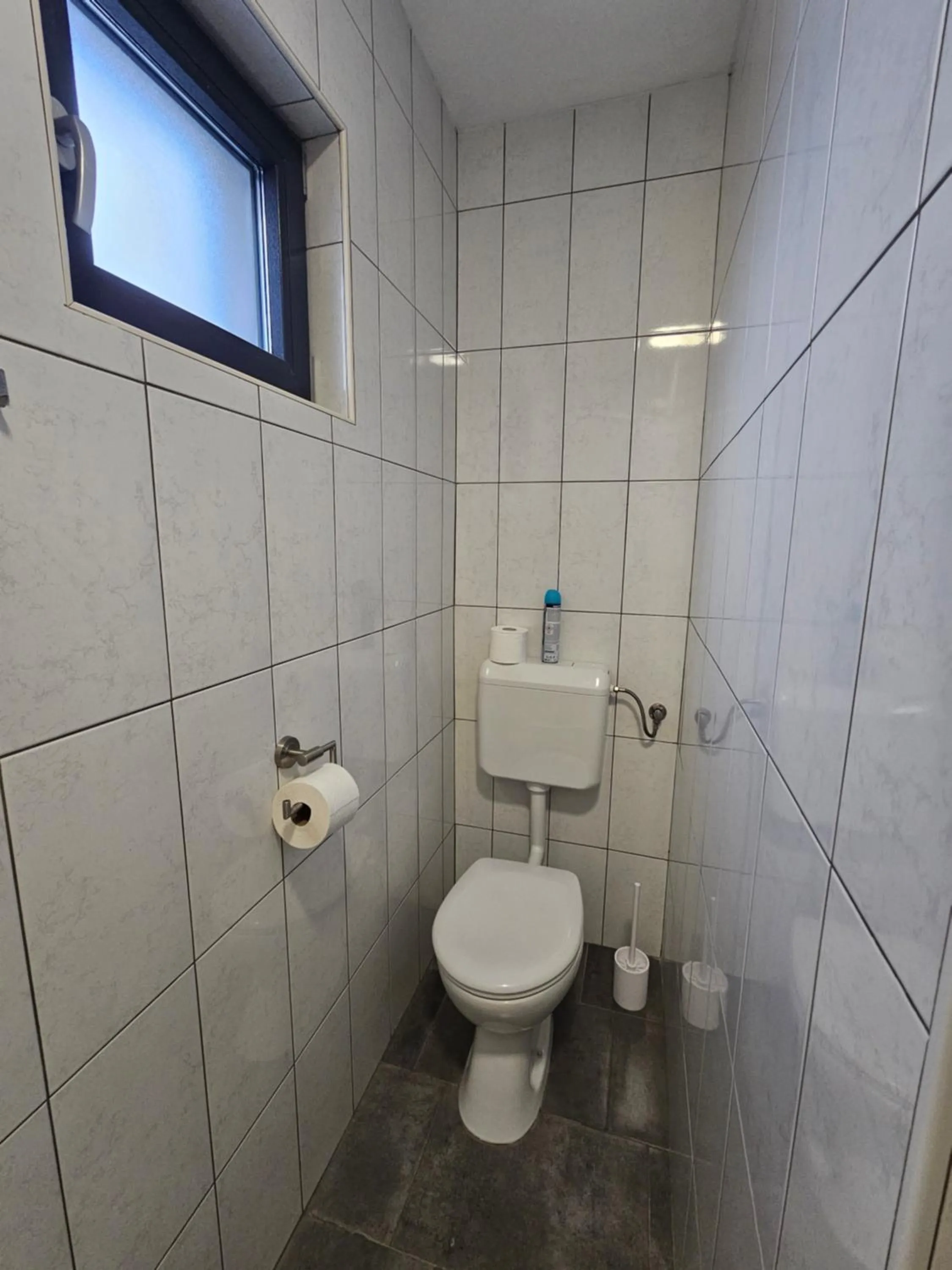 Toilet in Filipovic rent a car & apartments