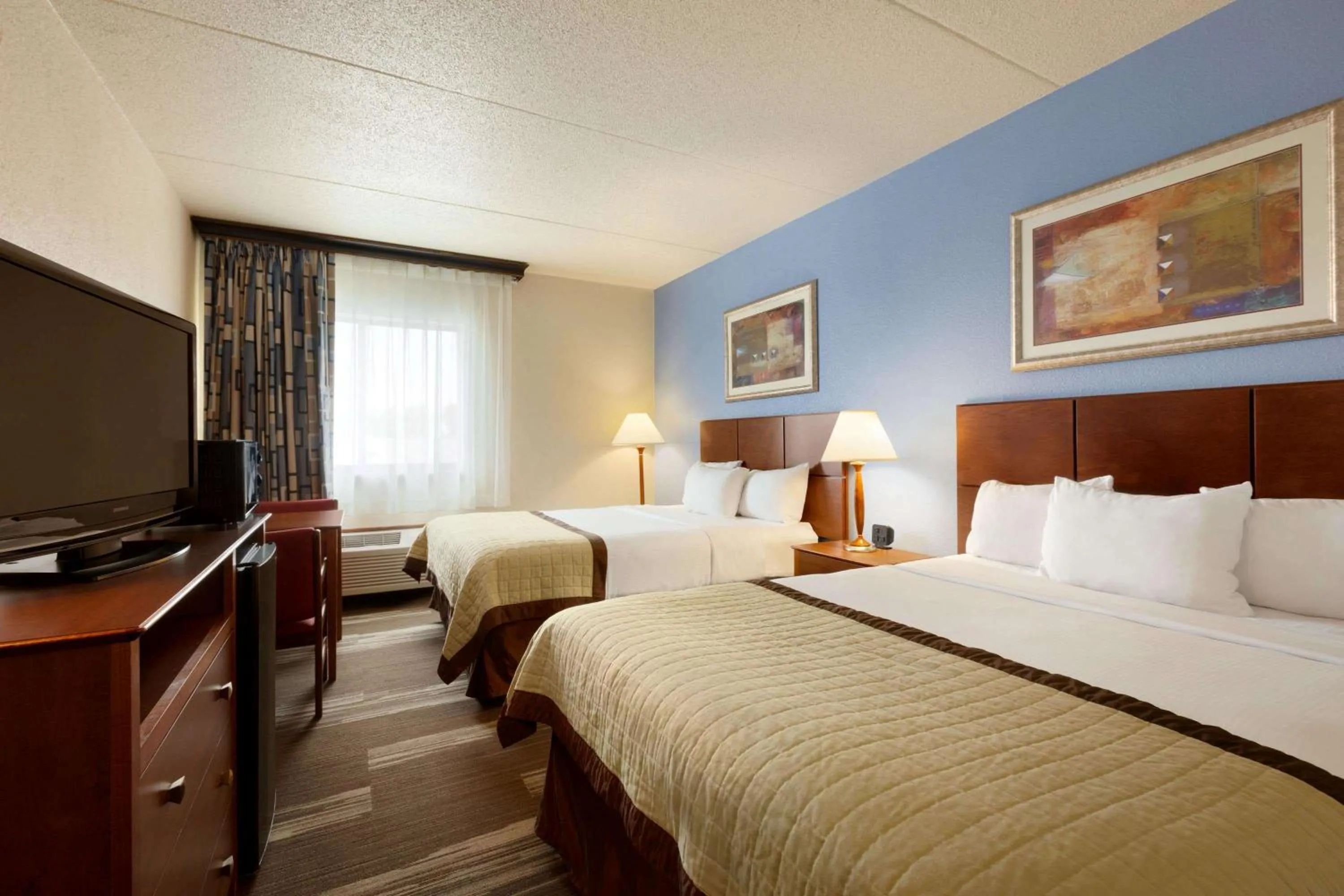Photo of the whole room, Bed in Ramada by Wyndham Fargo