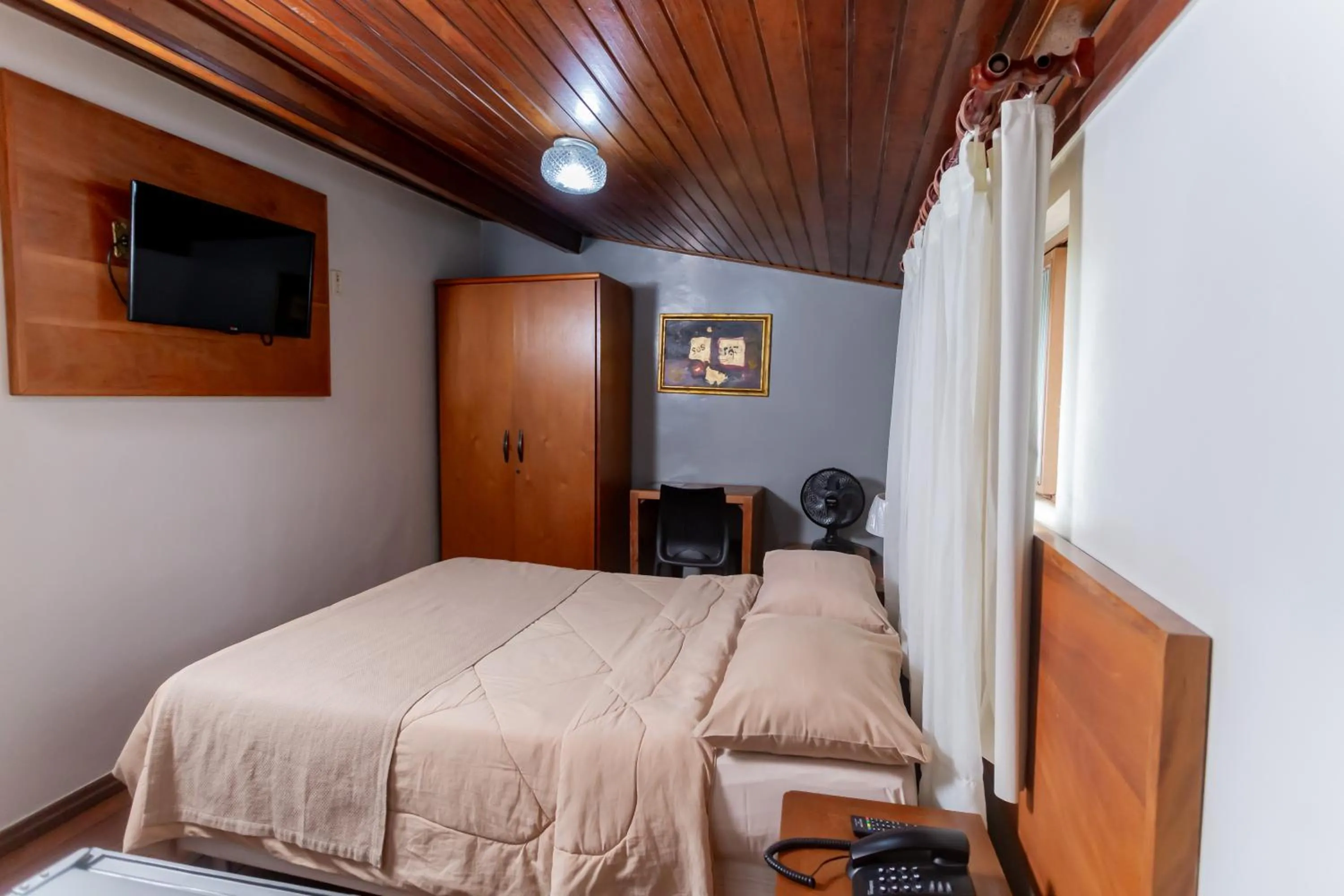 Bed in Pousada do Chafariz