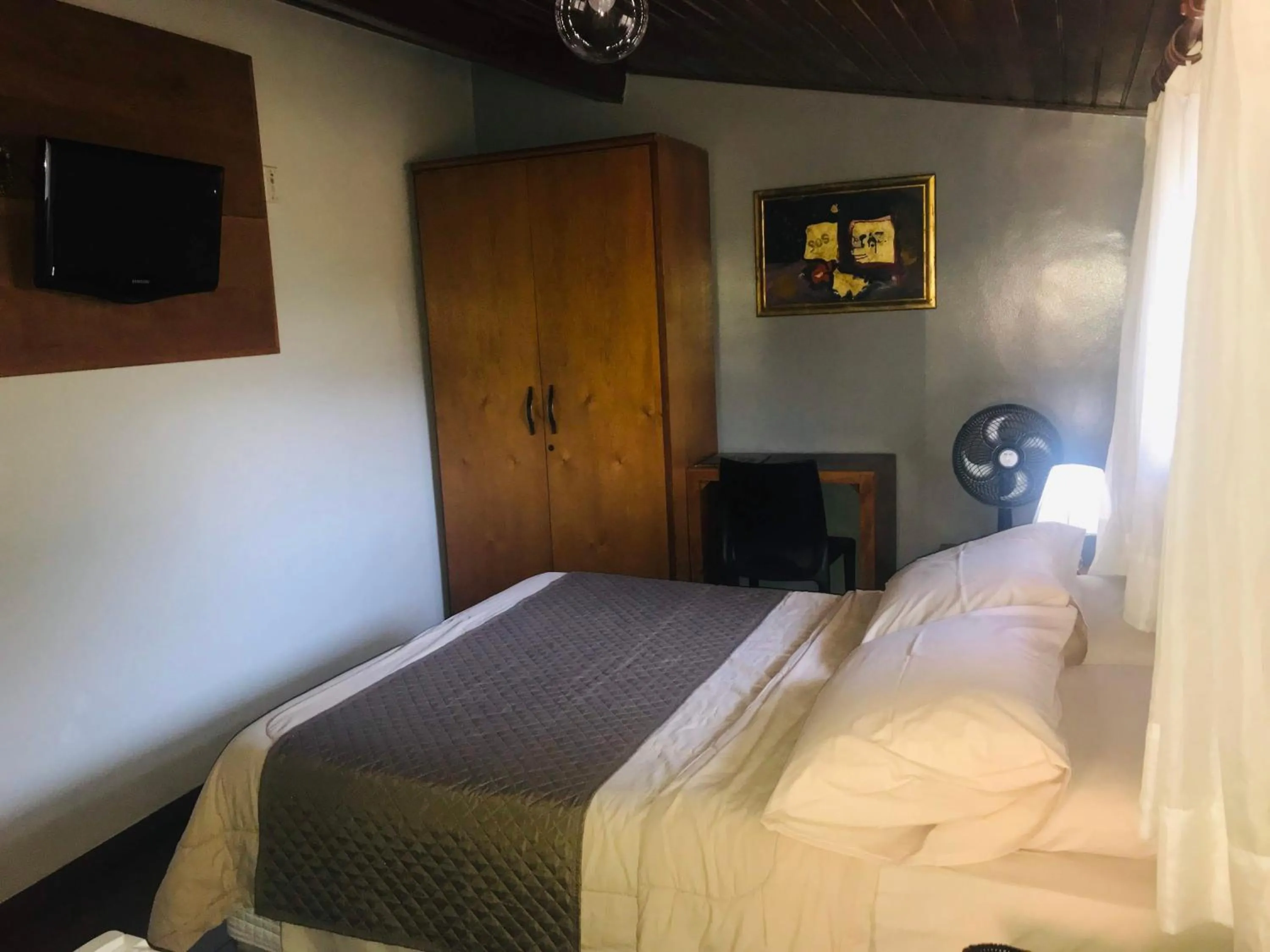 Bed in Pousada do Chafariz