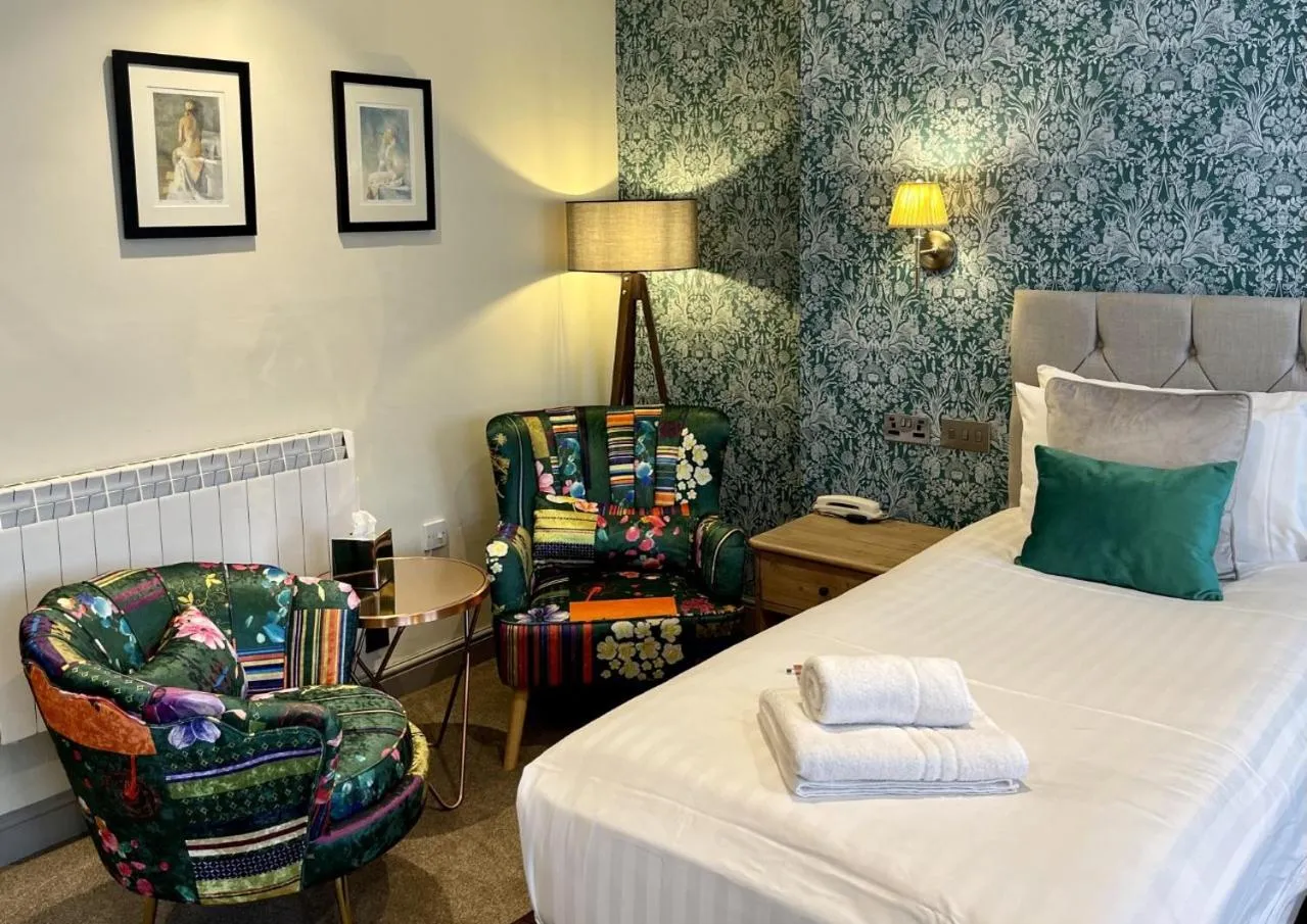 Bed in The Angel Inn Hotel