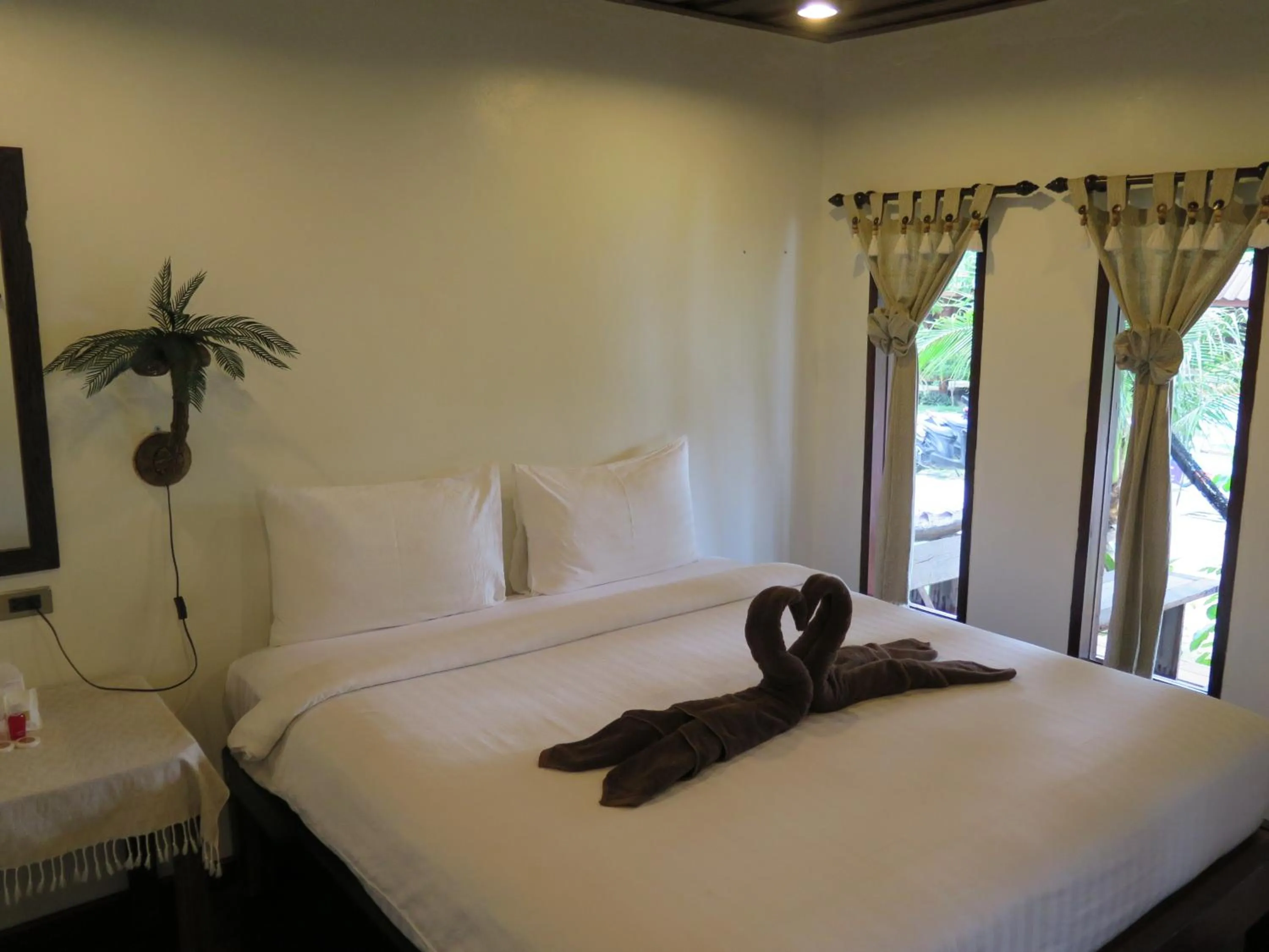 Bed in V-View Beach Resort
