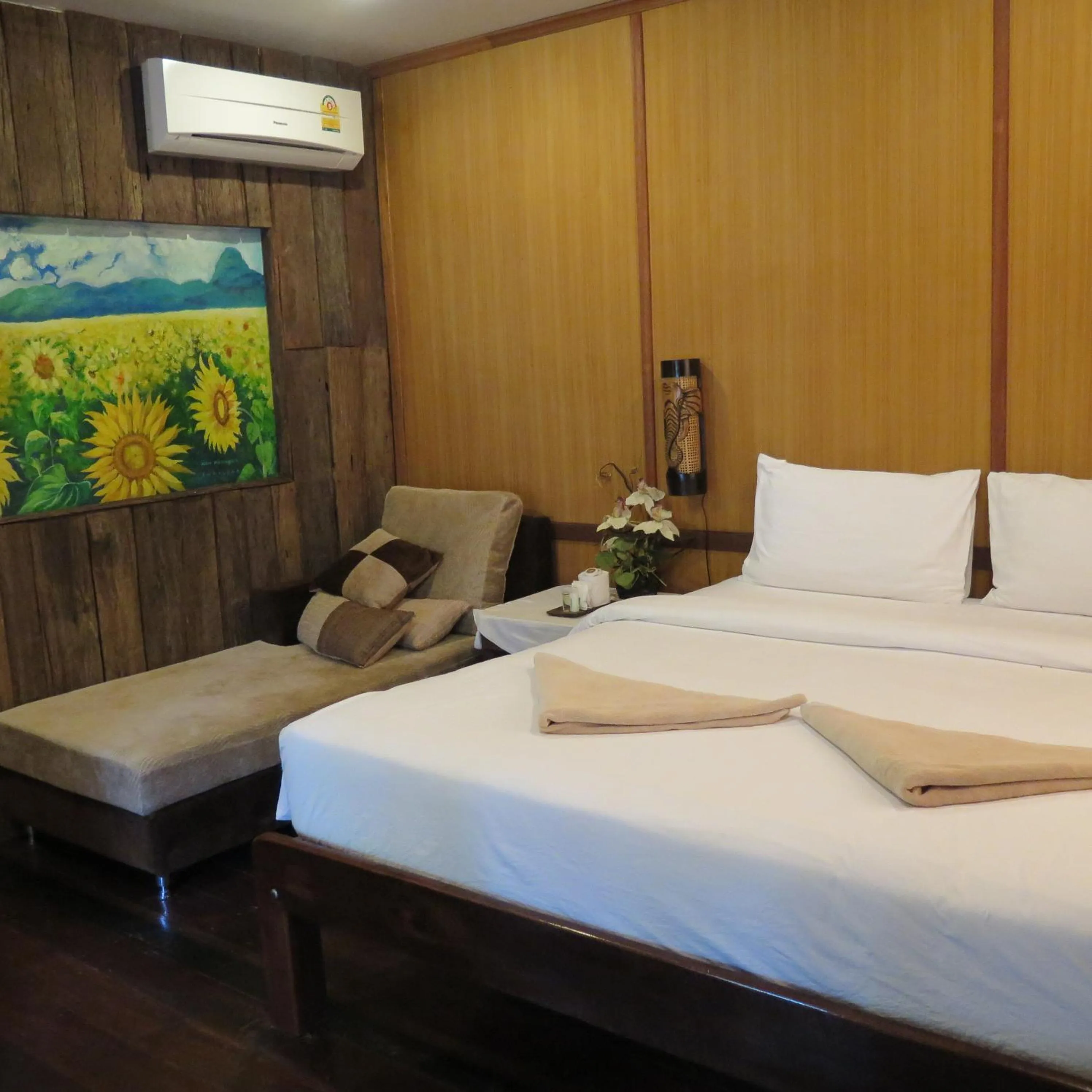 Bed in V-View Beach Resort