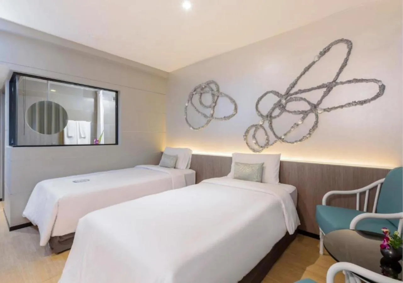 Bed in Pearl Hotel Phuket