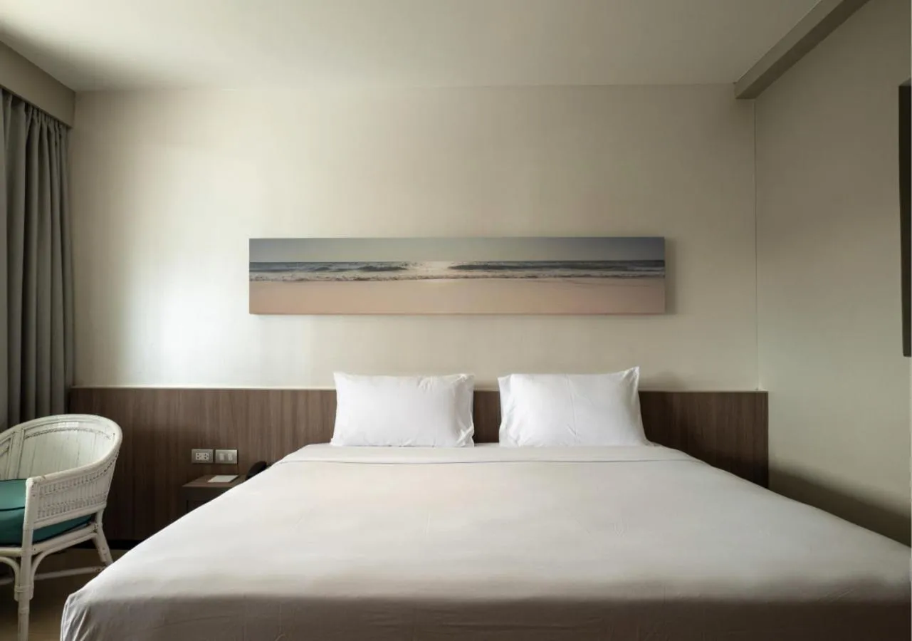 Bed in Pearl Hotel Phuket