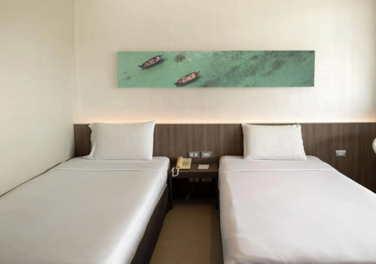 Bed in Pearl Hotel Phuket