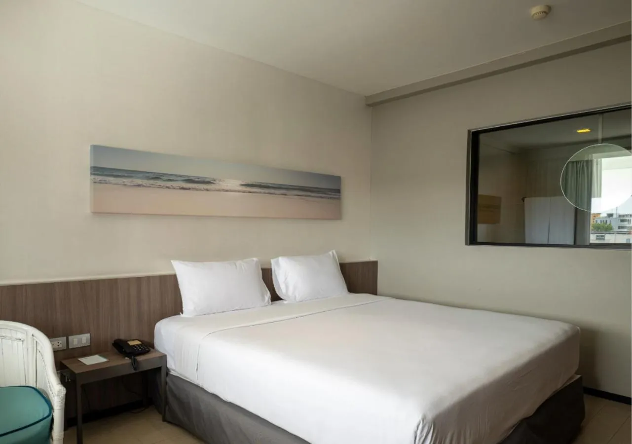 Bed in Pearl Hotel Phuket