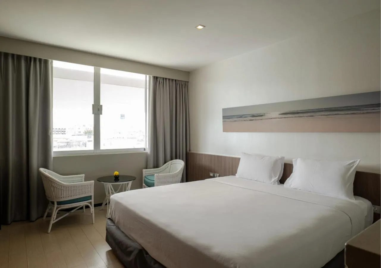 Bed in Pearl Hotel Phuket