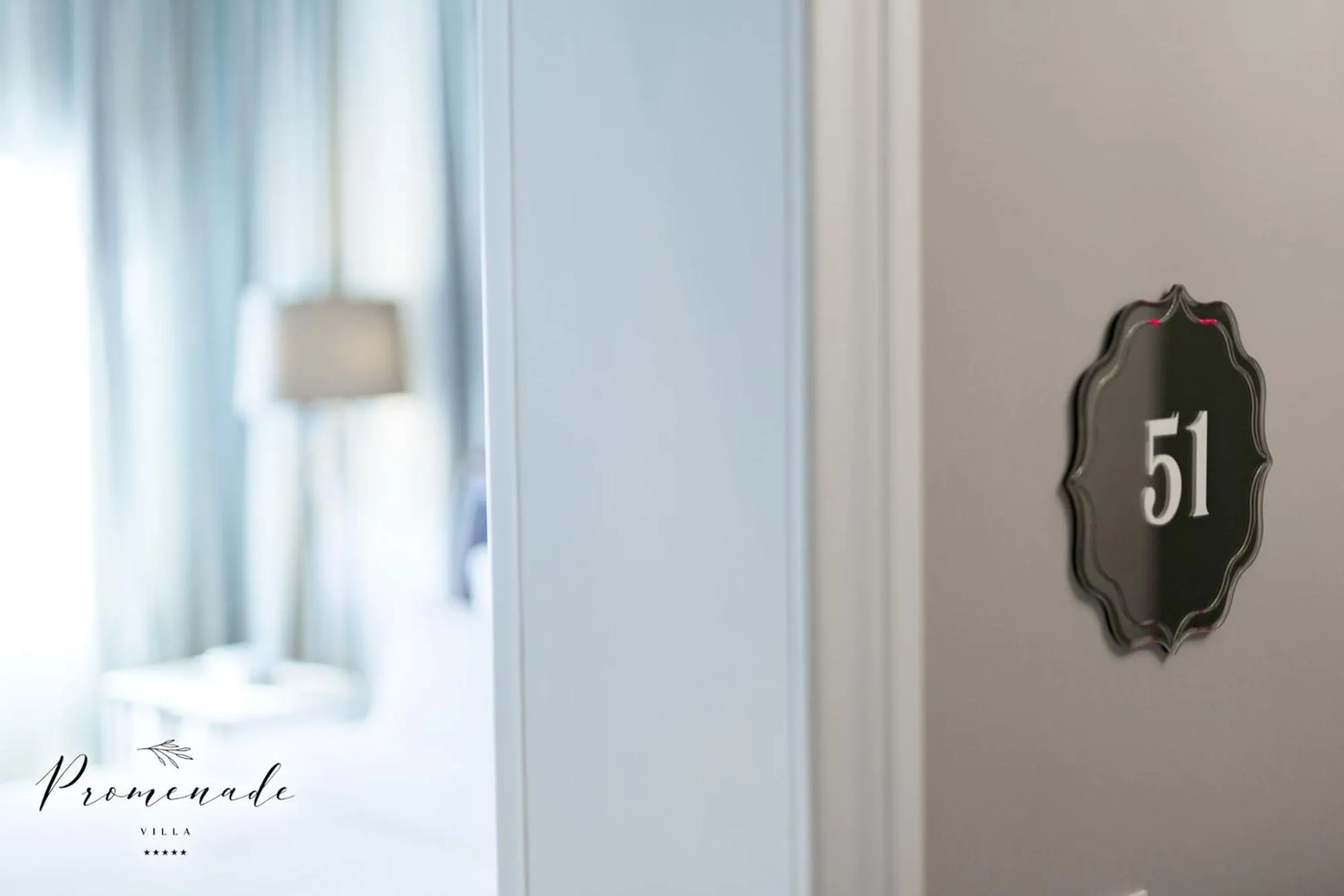 Property logo or sign in Villa Promenade