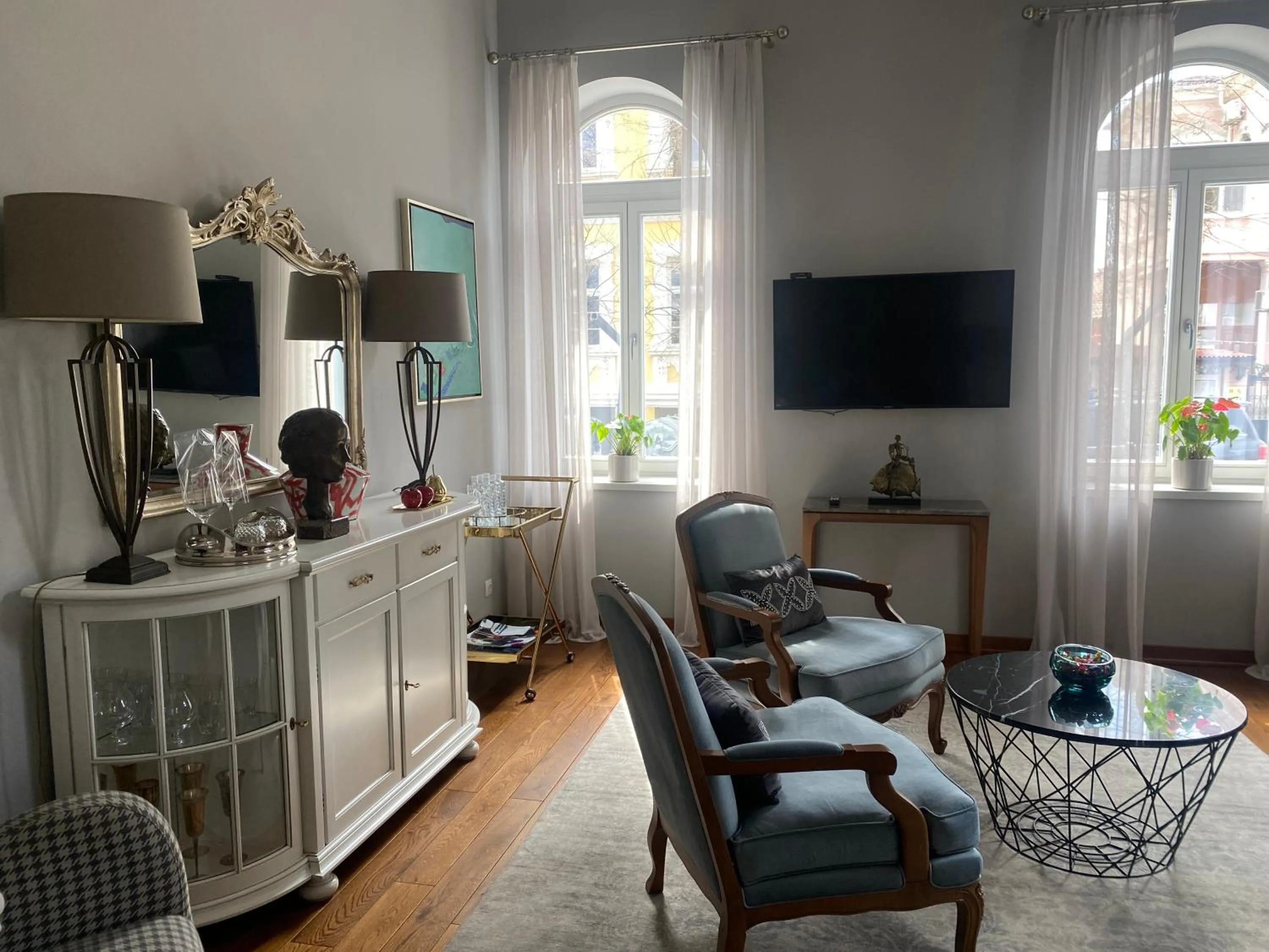 Communal lounge/ TV room in Villa Promenade