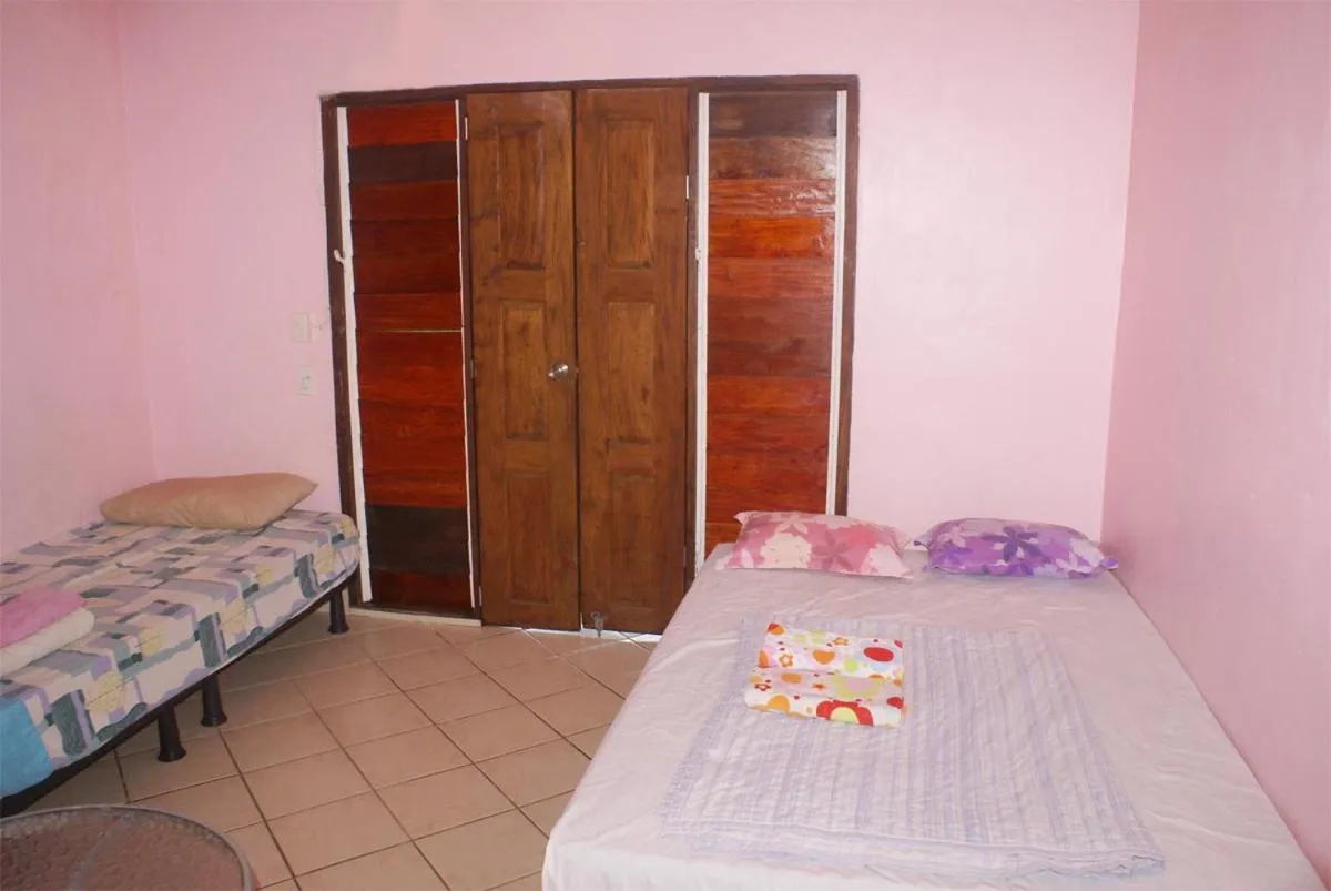 Bed in Bluepango Guest House