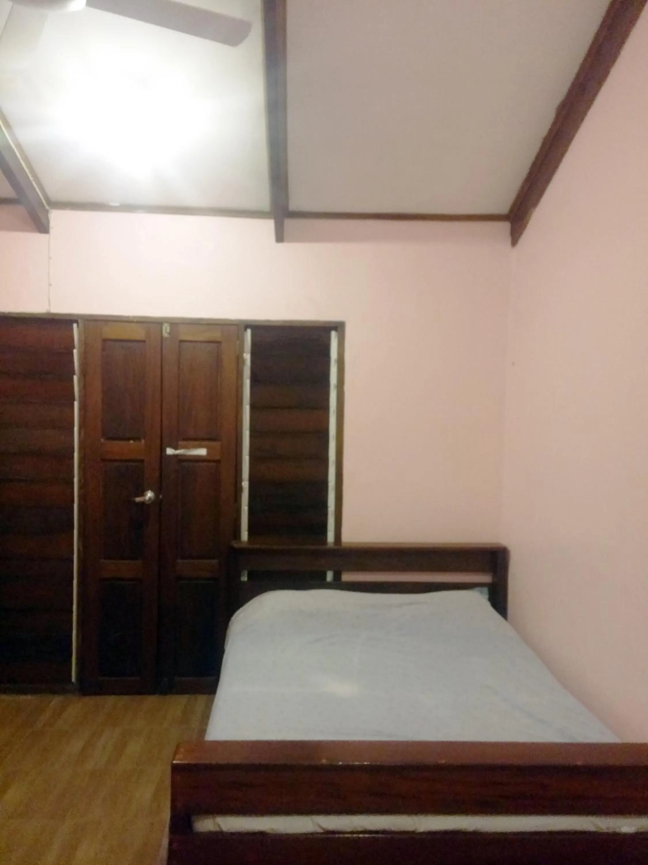 Bed in Bluepango Guest House