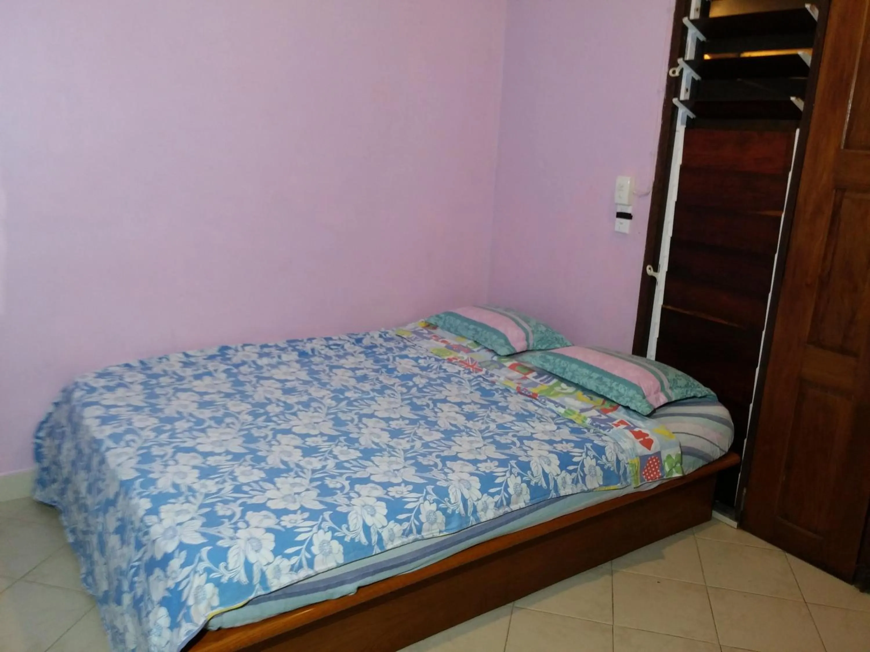 Bed in Bluepango Guest House