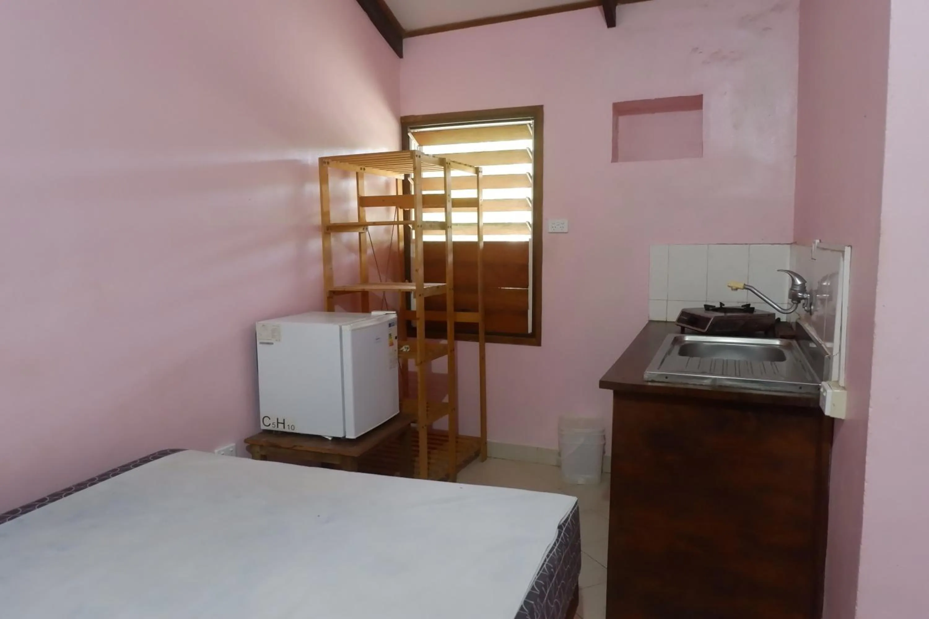 Bed in Bluepango Guest House