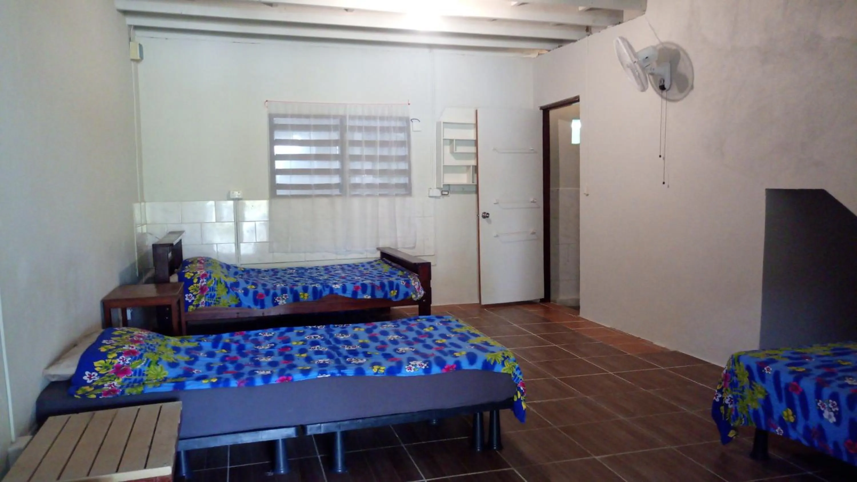 Bed in Bluepango Guest House