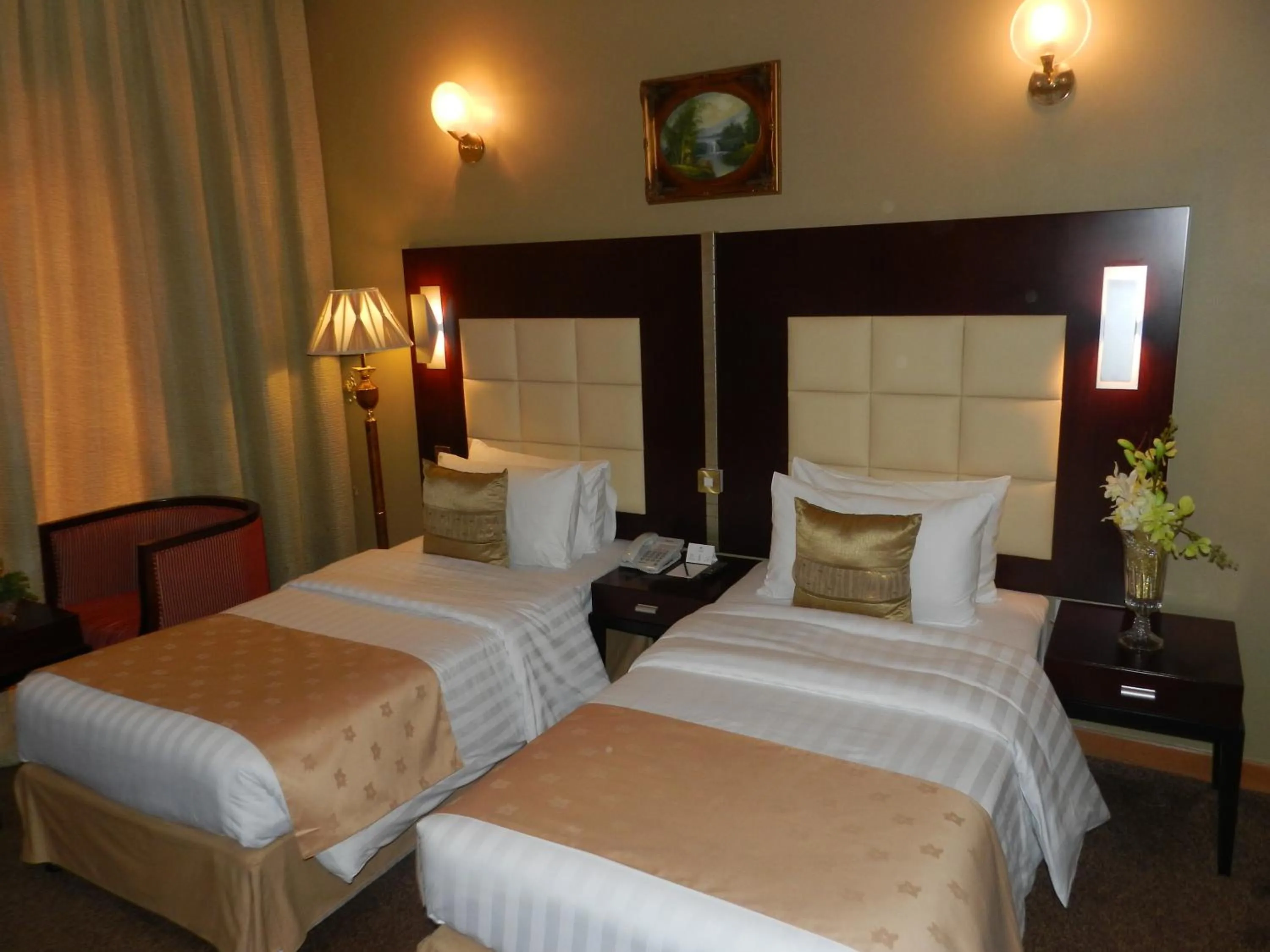 Bed in Sun & Sands Sea View Hotel