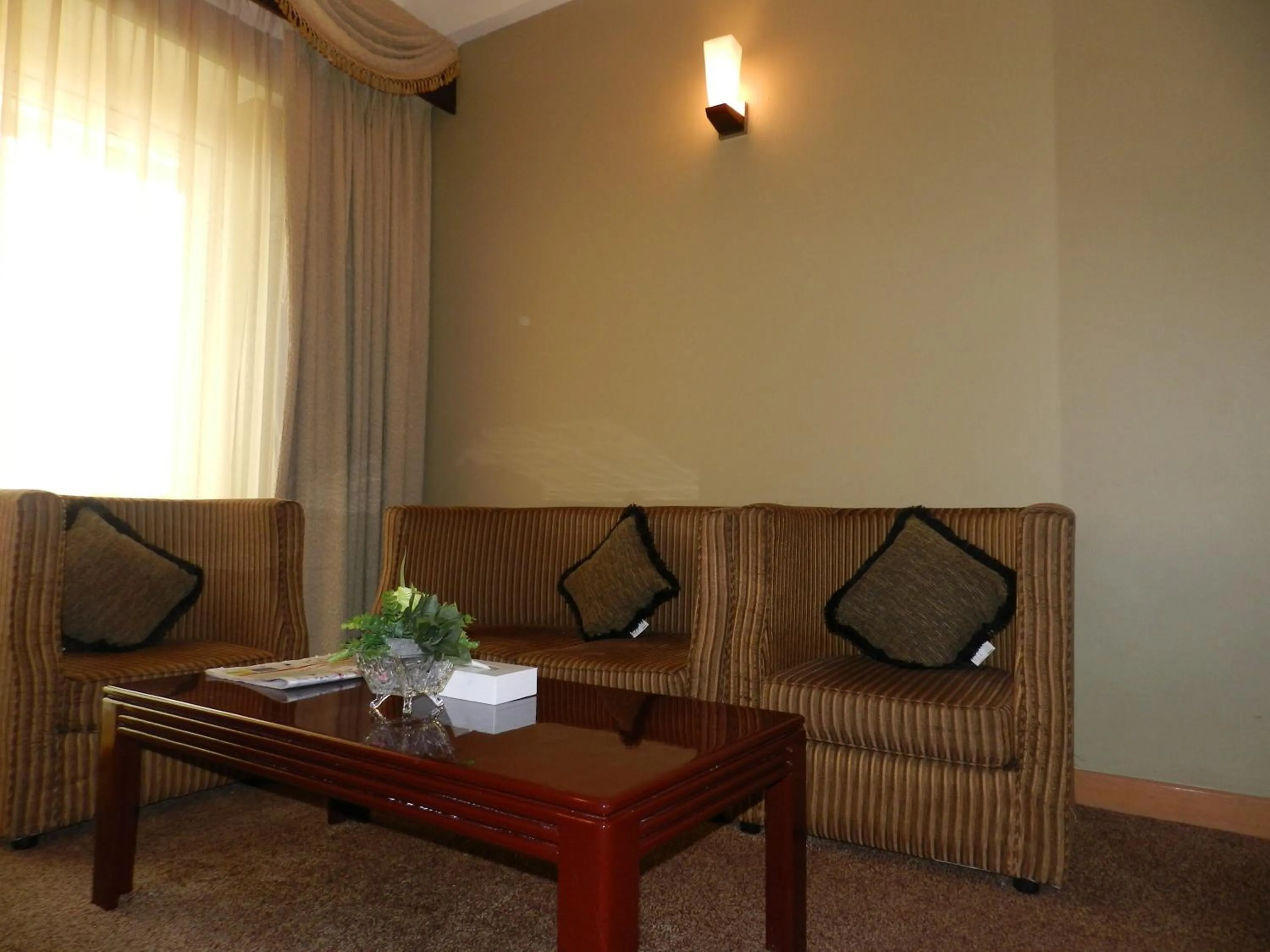 Living room in Sun & Sands Sea View Hotel