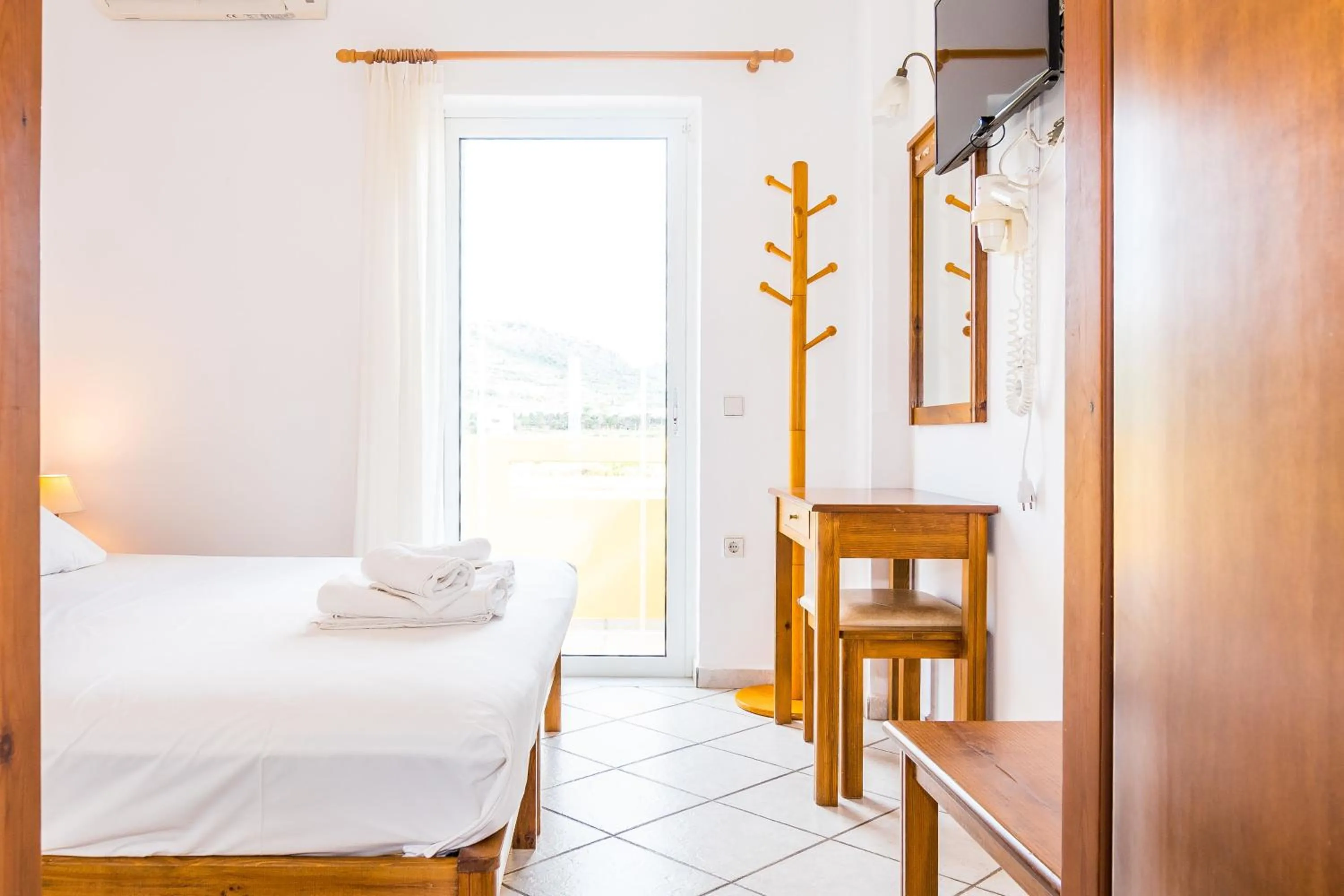 Bed in Thalassa Apartments