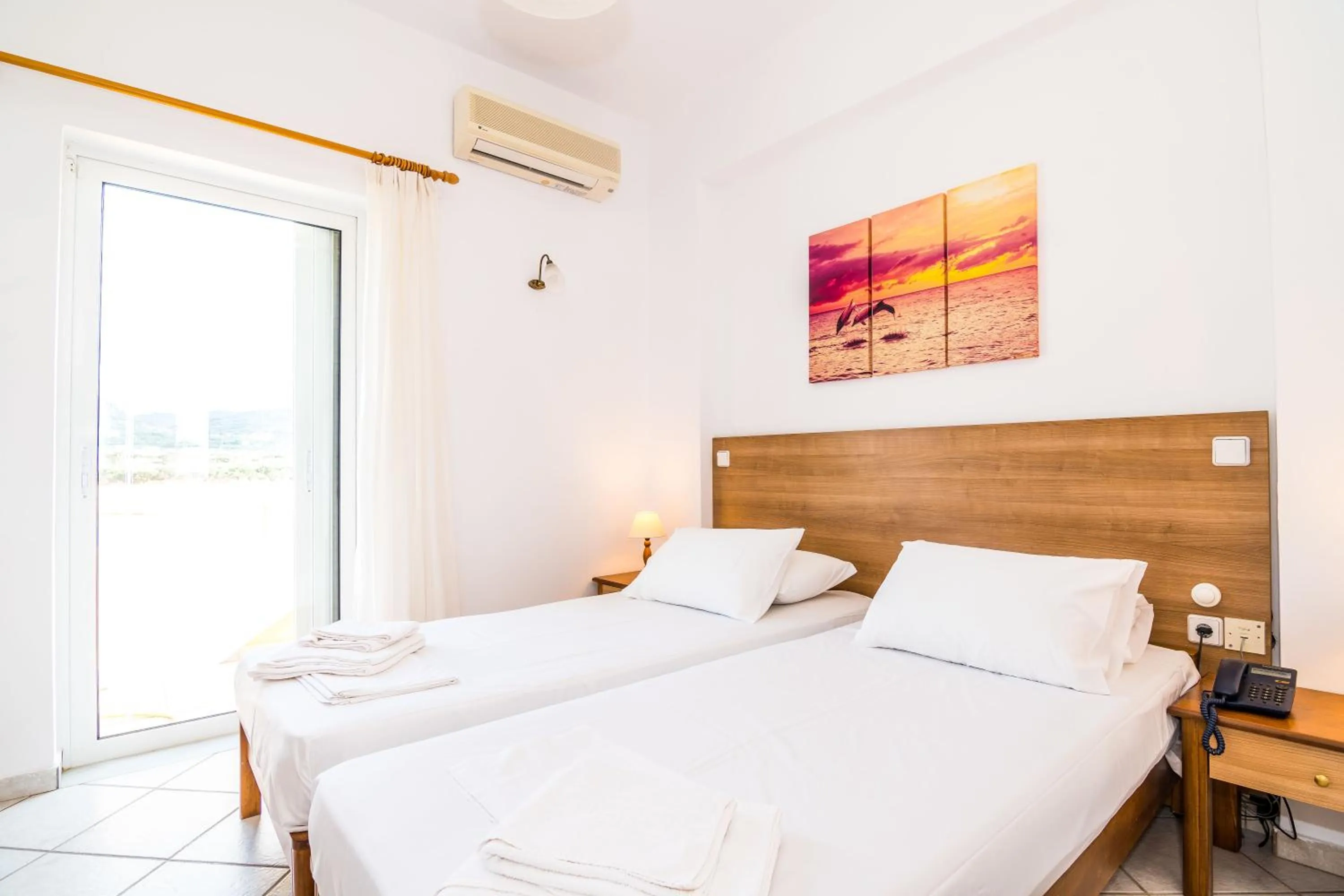 Bed in Thalassa Apartments