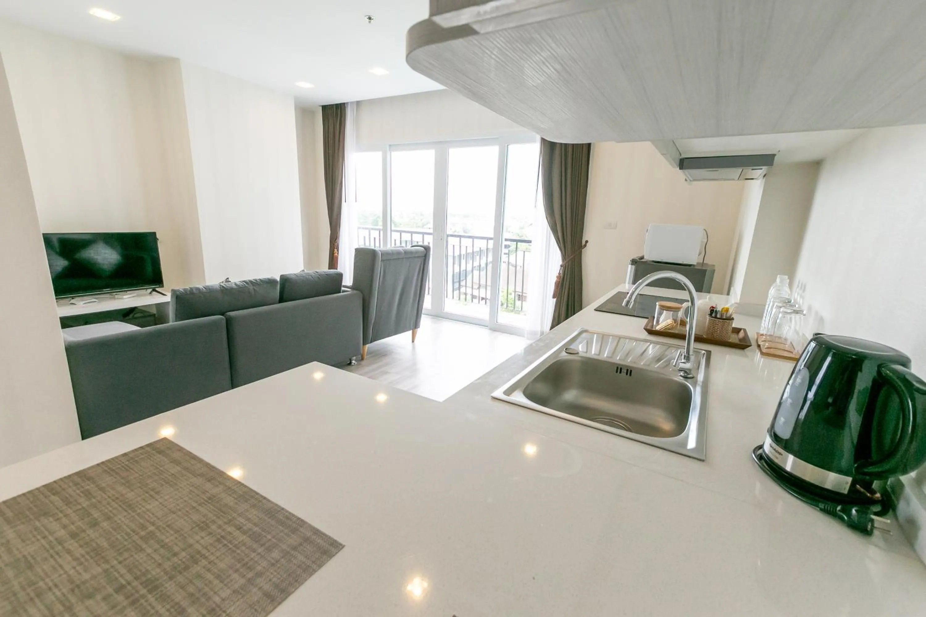 Kitchen or kitchenette in Locals Prio ChiangMai Central Airport Plaza