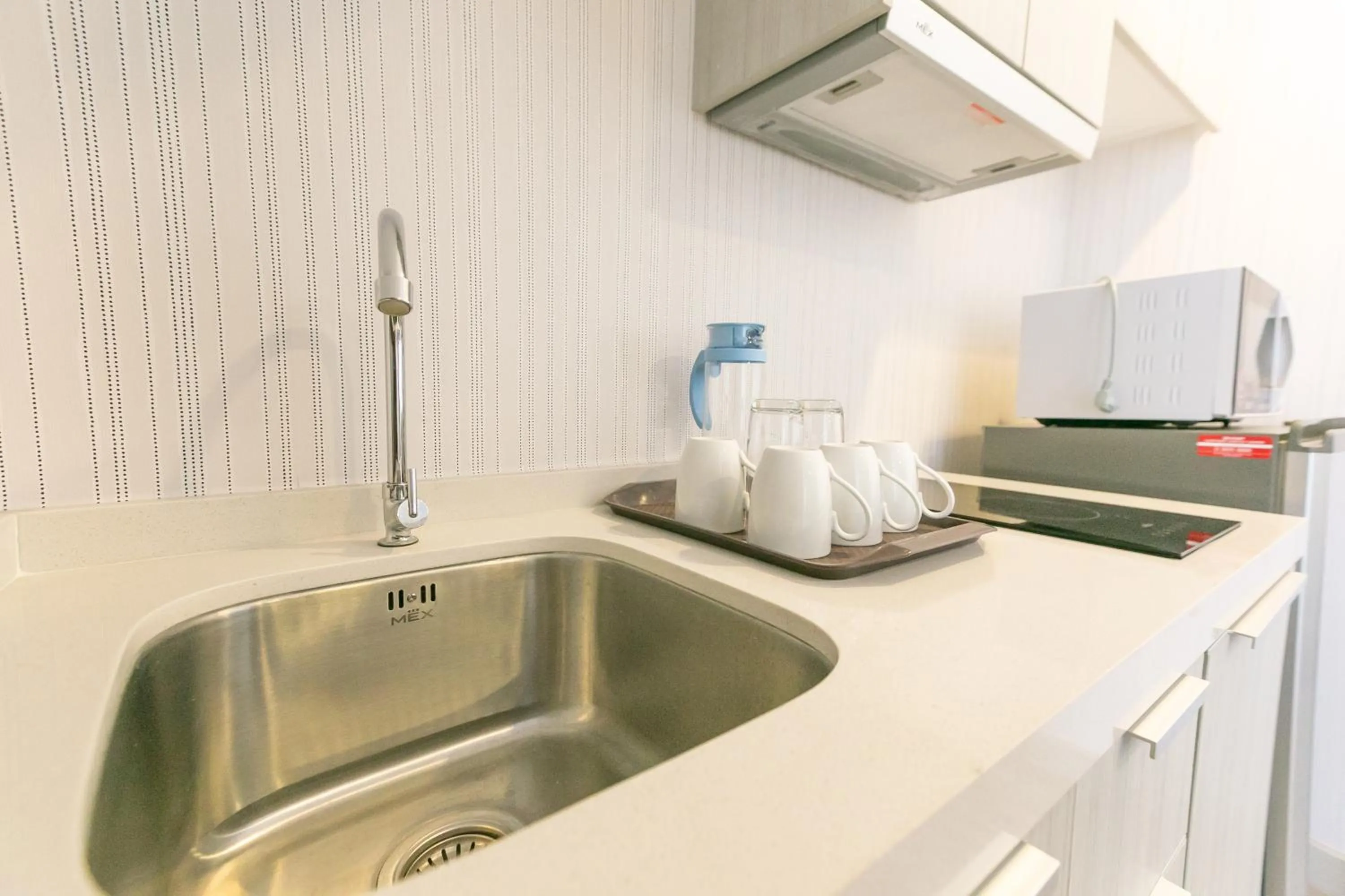 Kitchen or kitchenette in Locals Prio ChiangMai Central Airport Plaza