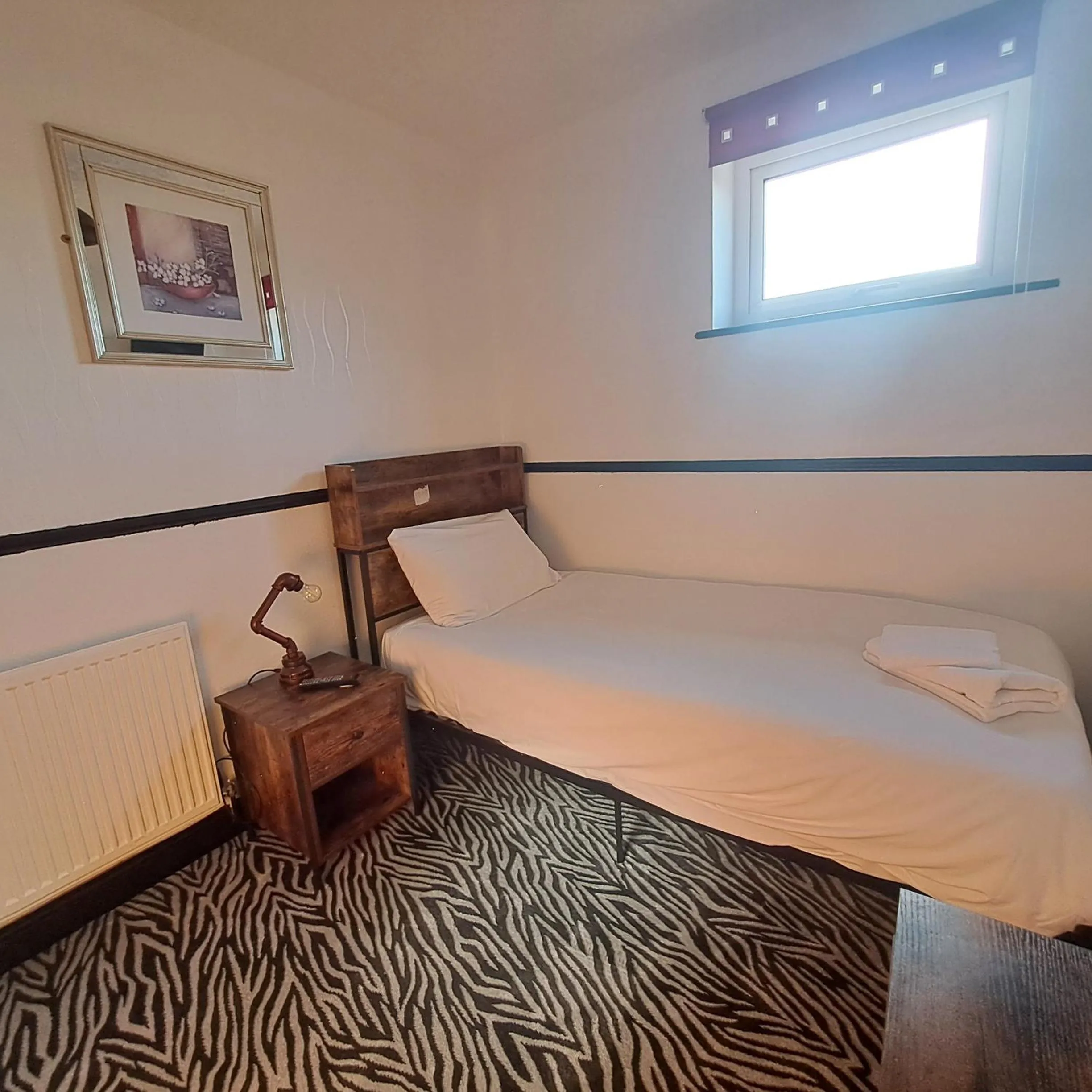 Bed in Boathouse Hotel