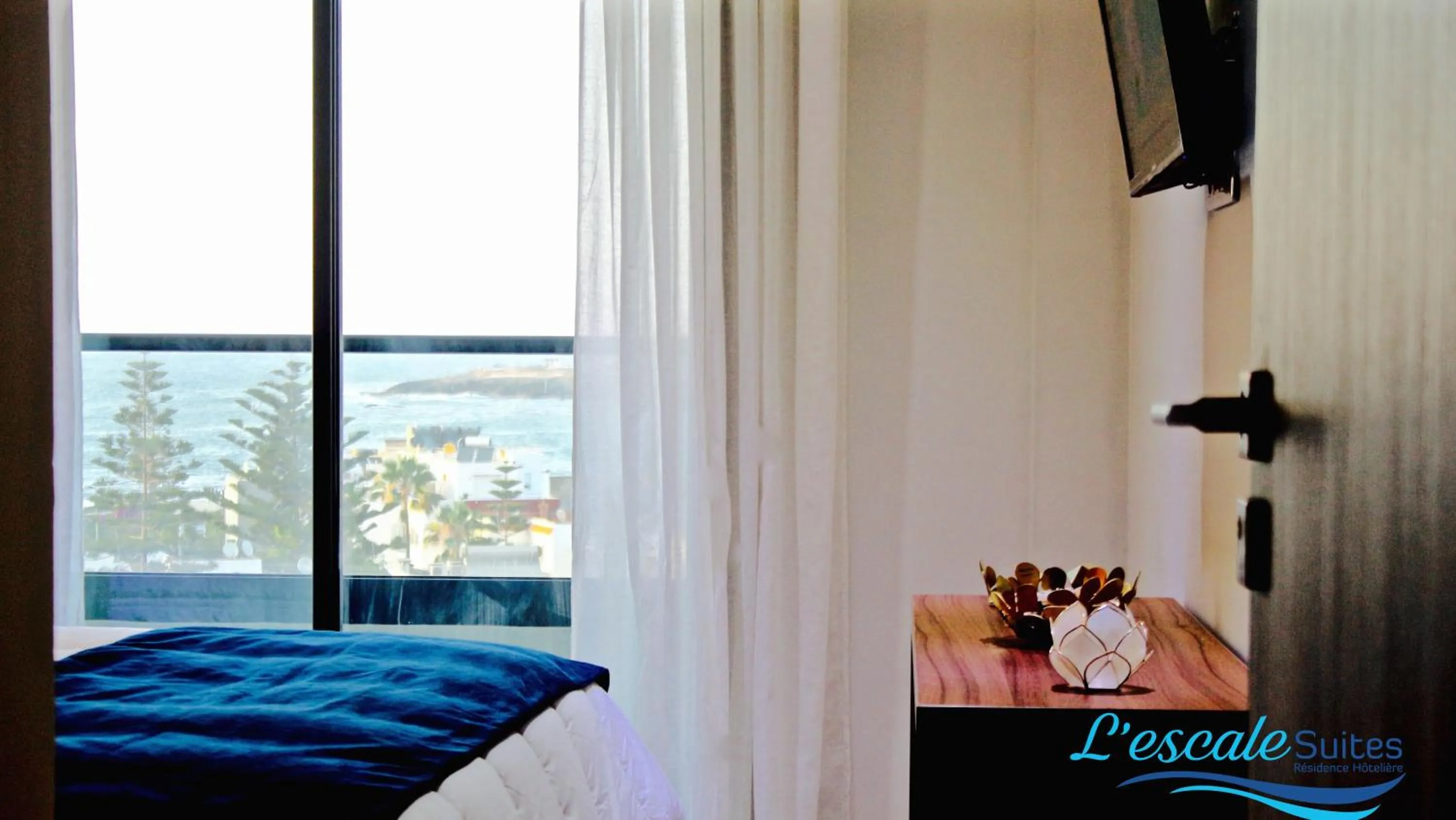 Bed in L'escale Suites Résidence Hôtelière By 7AV HOTELS