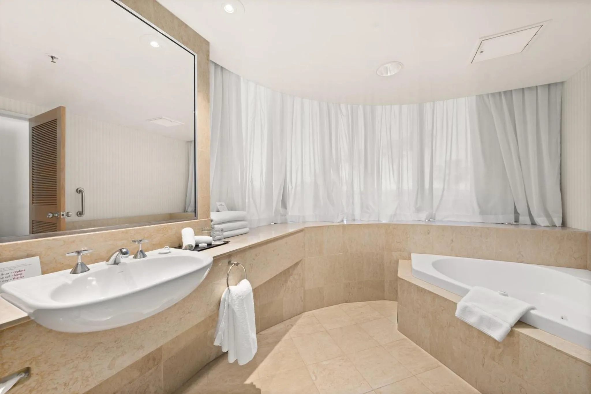 Bathroom in Crowne Plaza Surfers Paradise by IHG
