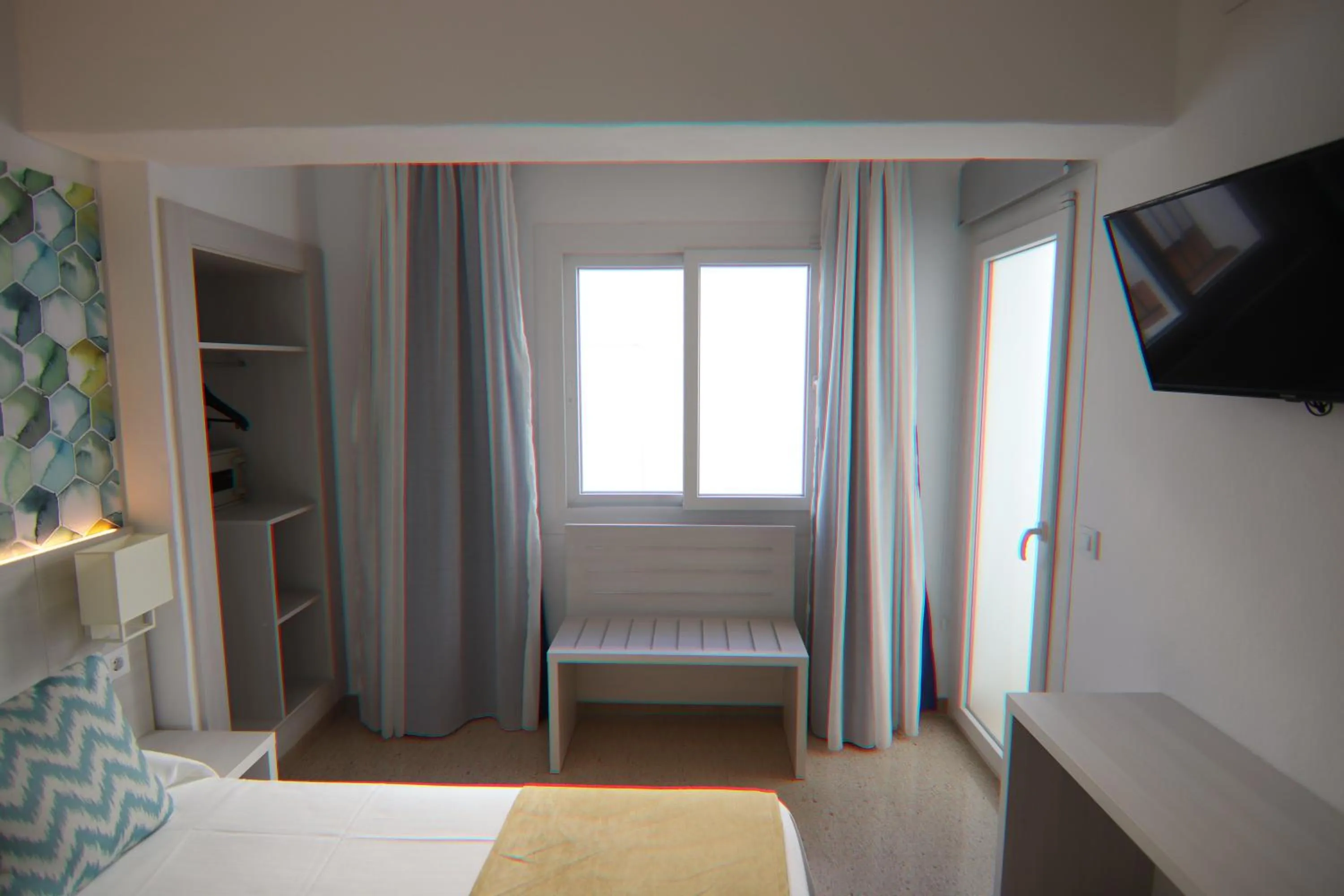 TV and multimedia, Bed in Hostal Cala Ratjada